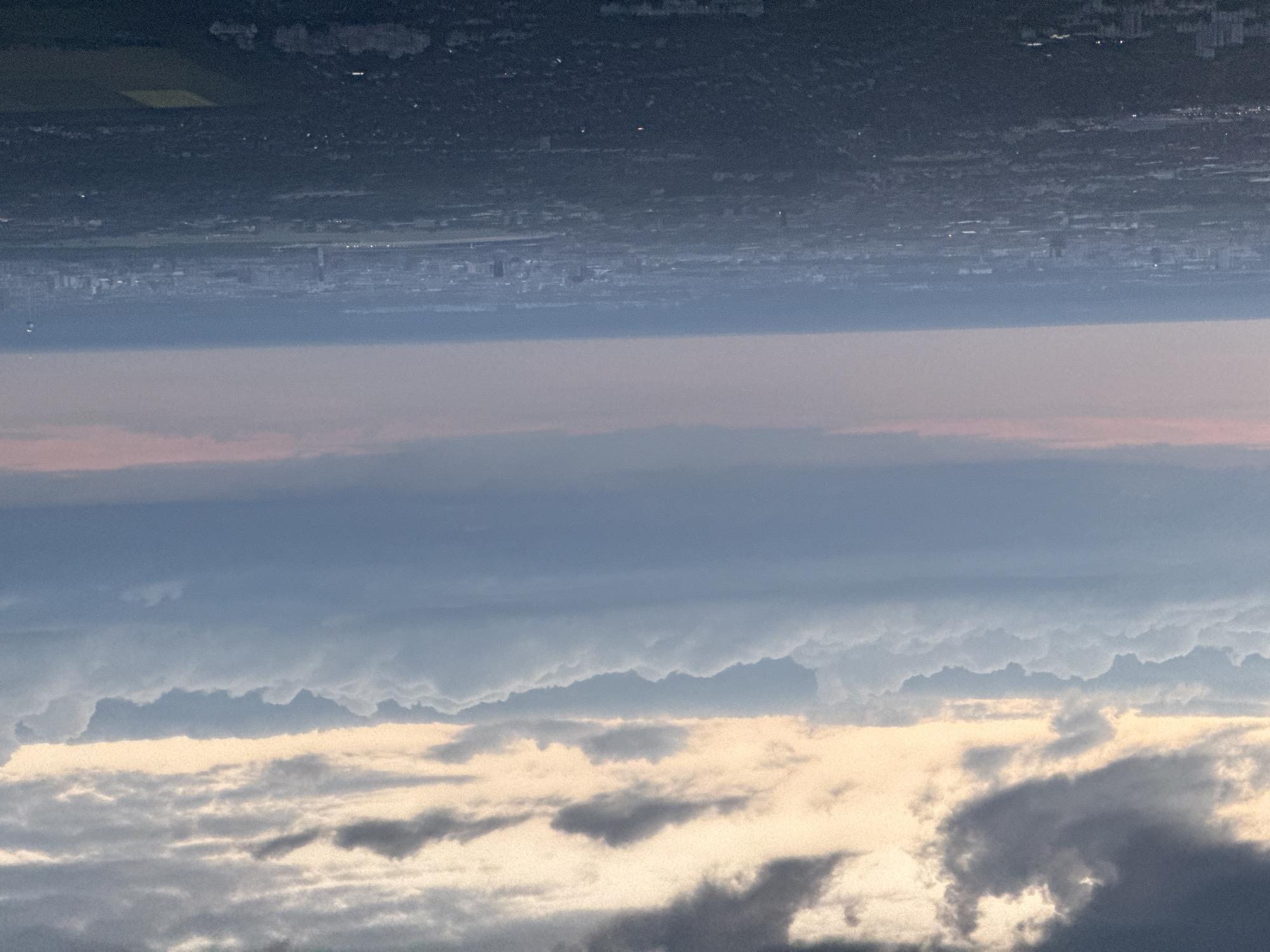Aircraft passenger films dramatic evening sky over Schönefeld