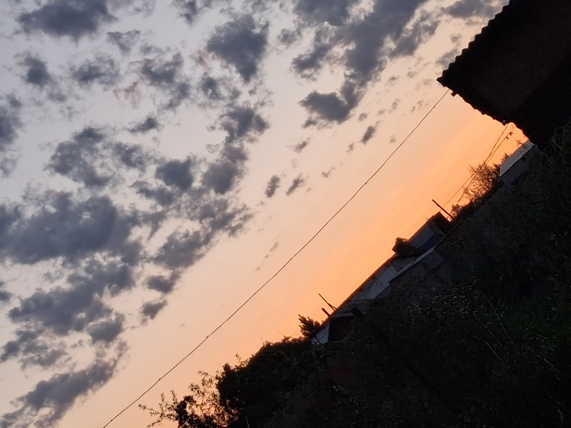 Sunset over Semey's outskirts, clouds and silhouettes