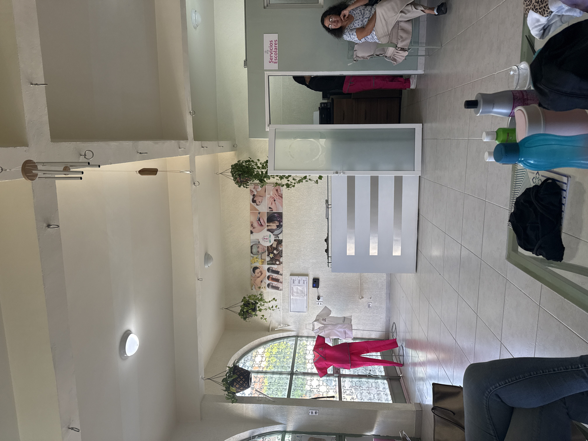 Woman documents hair salon visit in Puebla, Mexico