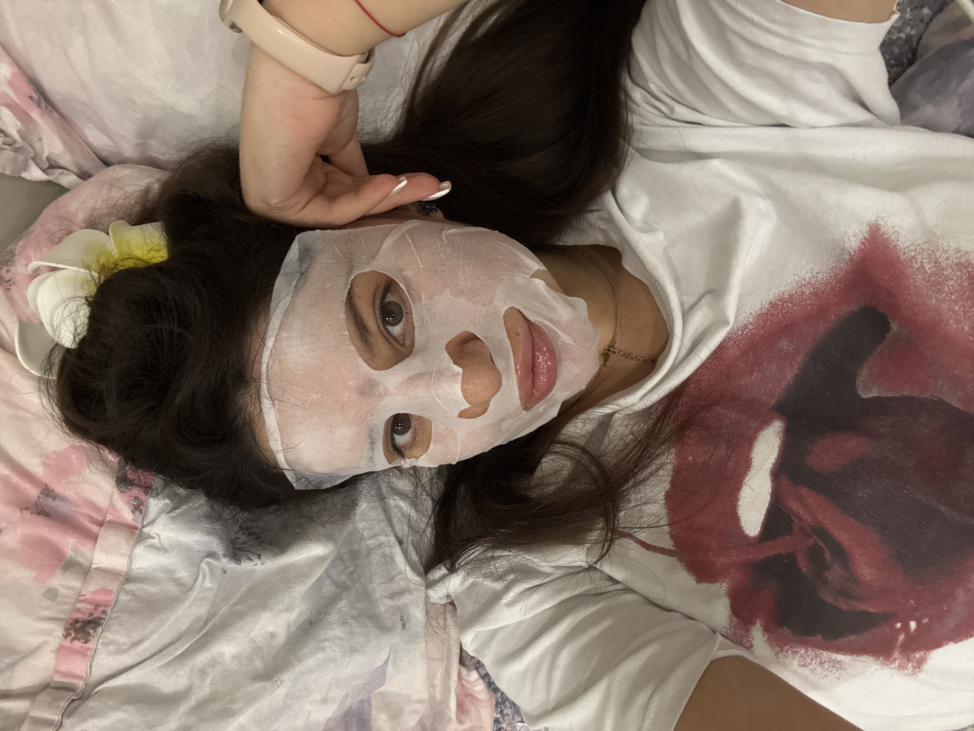 Woman enjoys skincare routine with facial mask in Burgas