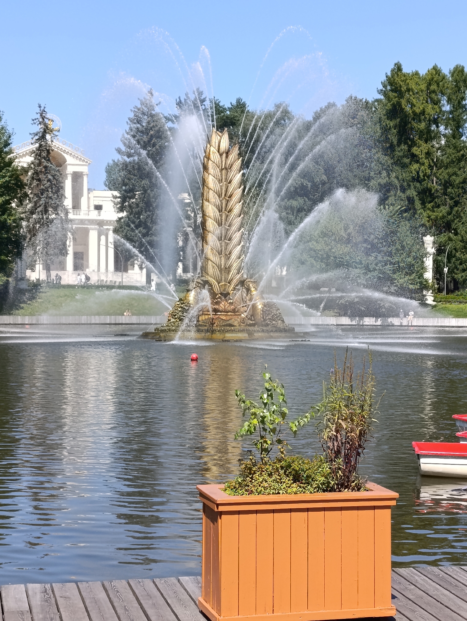Summer morning at VDNKh — fountains, car show, and park life