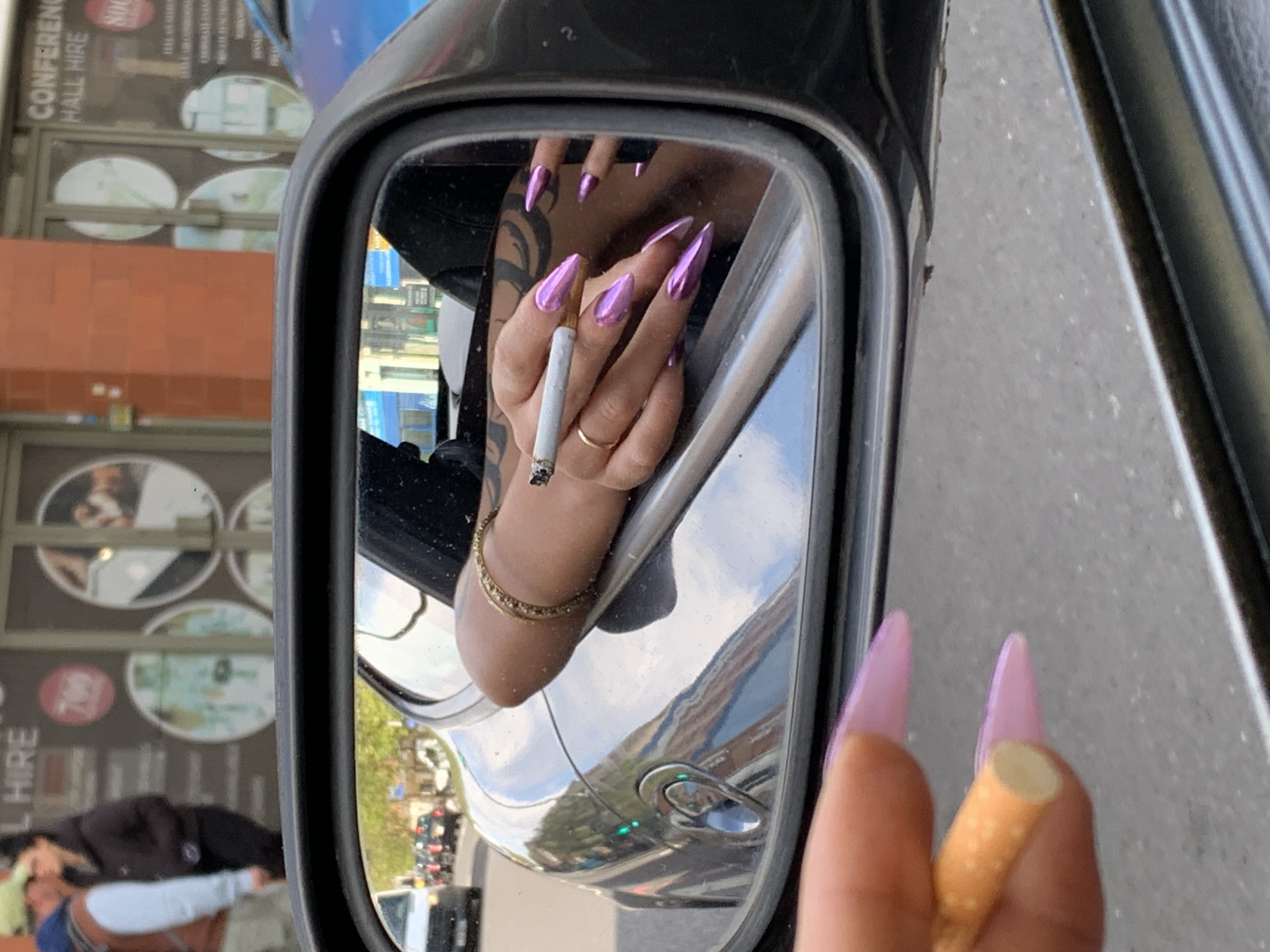 Disparate London moments captured: car mirror reflection, lime green