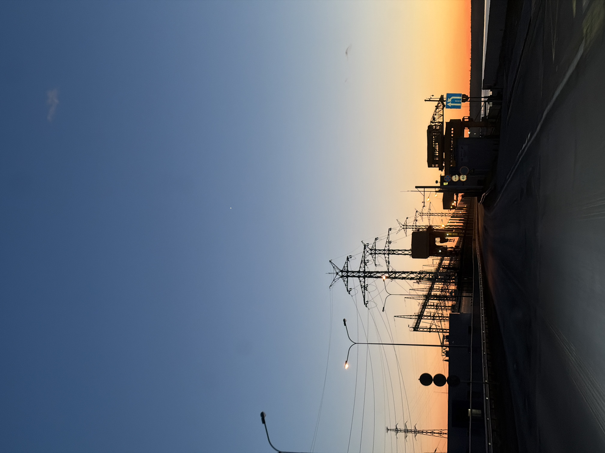 Evening drive through industrial Chaikovsky captured at dusk