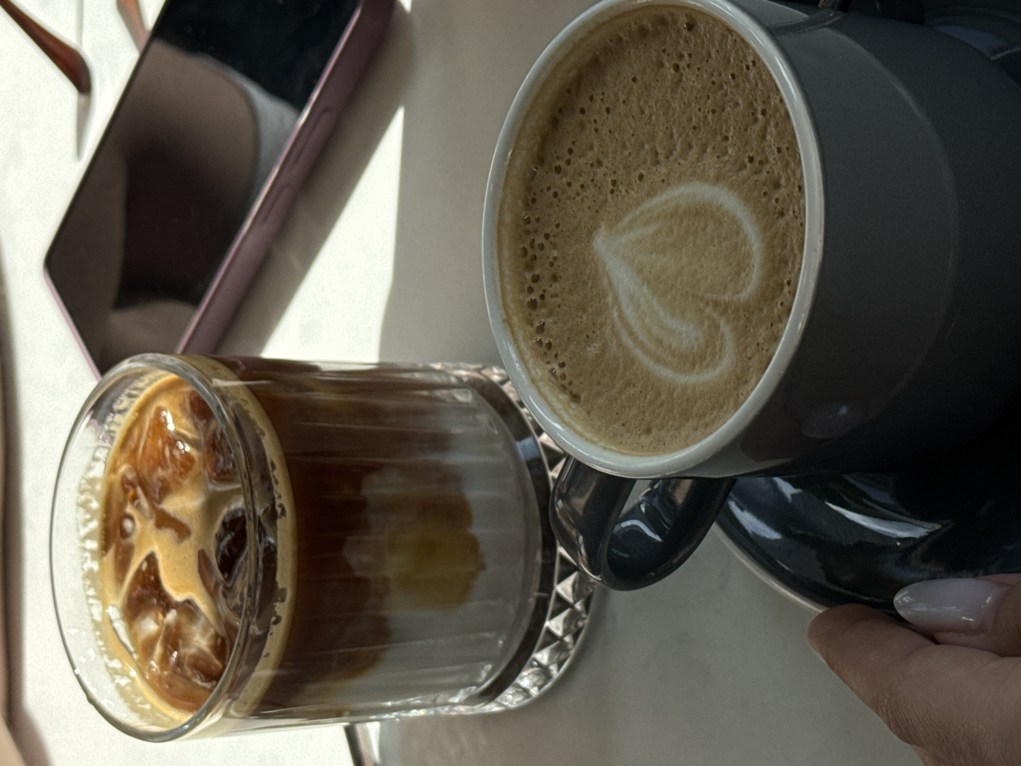 Café catch-up with lattes, avocado toast, and good light