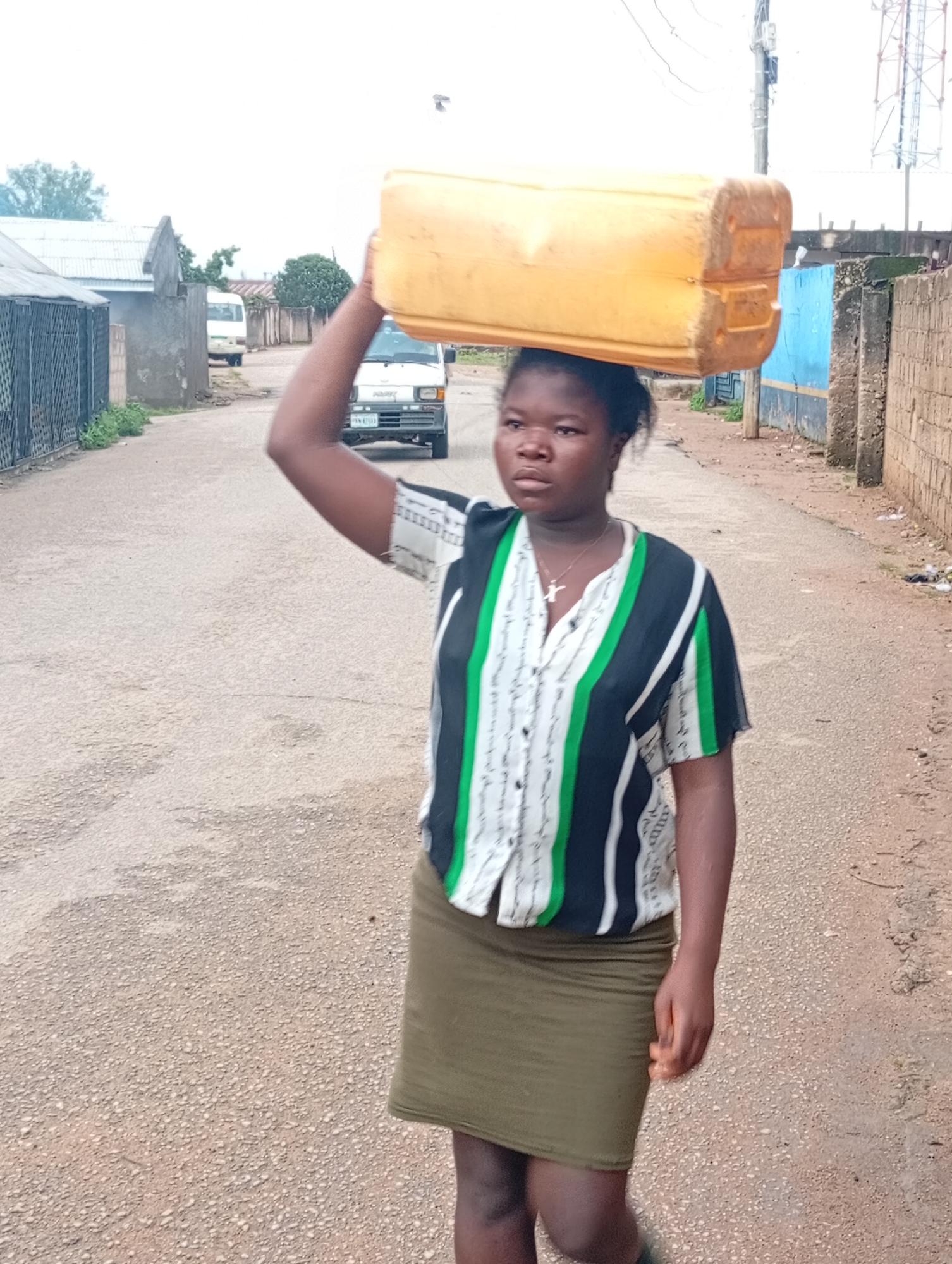 Morning routines on the streets and inside homes in Jos