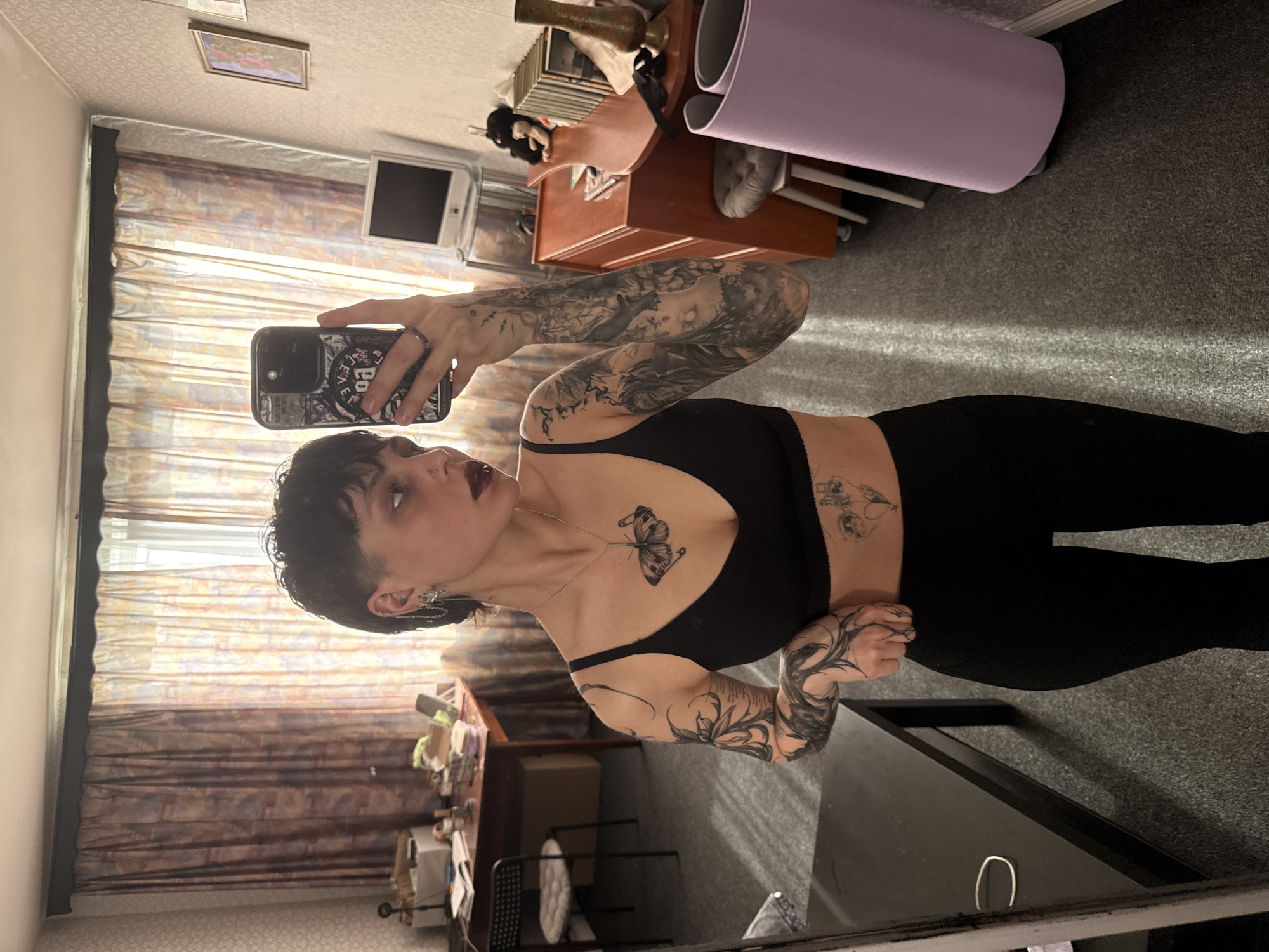 Tattooed individual documented smoking, selfies in Saint Petersburg