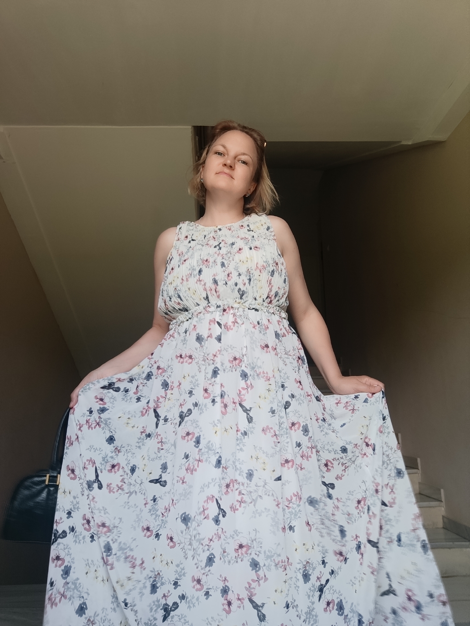 Summer shoot in a Russian village, floral dress and wildflowers