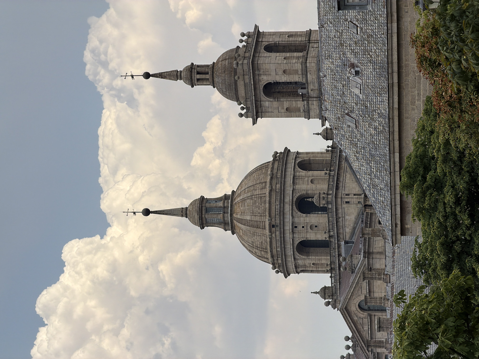 Afternoon foot traffic through El Escorial's monastery town