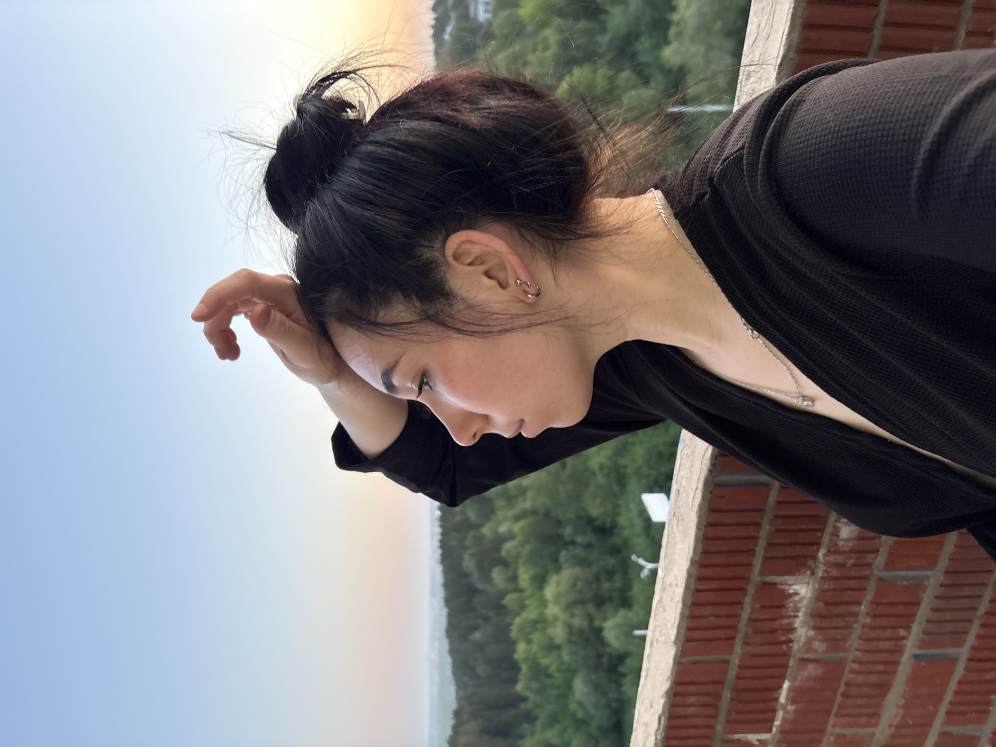 Sunset moments captured from Izhevsk rooftop with woman and cat