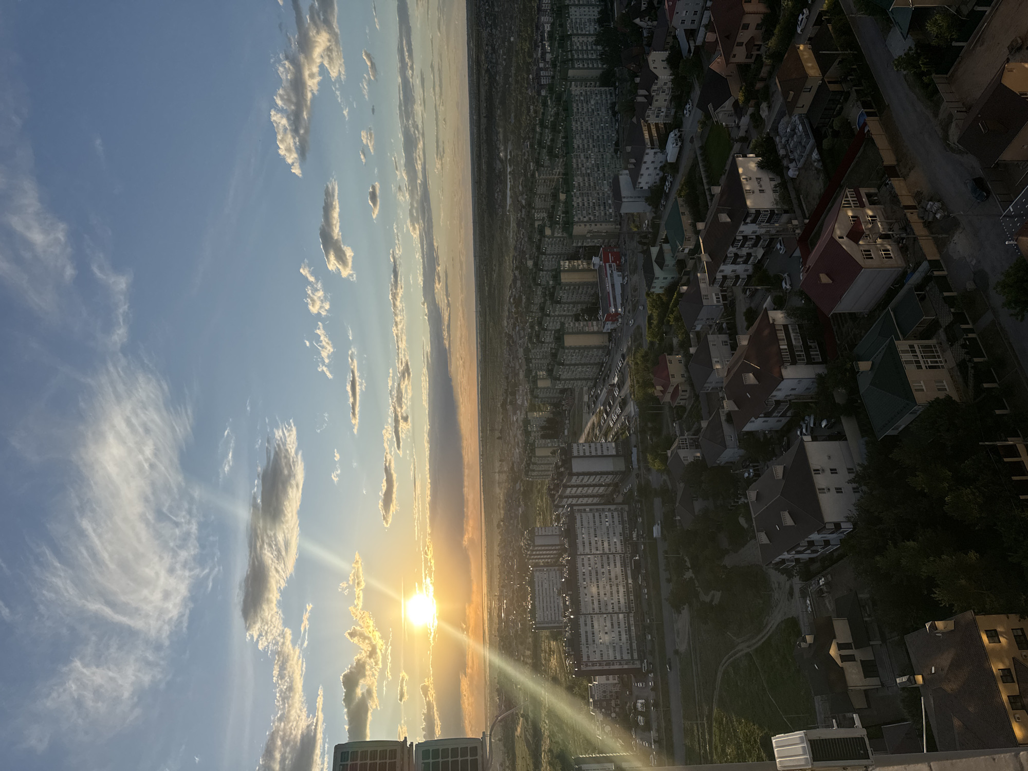 Sunset scenes captured across Volgograd neighborhoods and homes