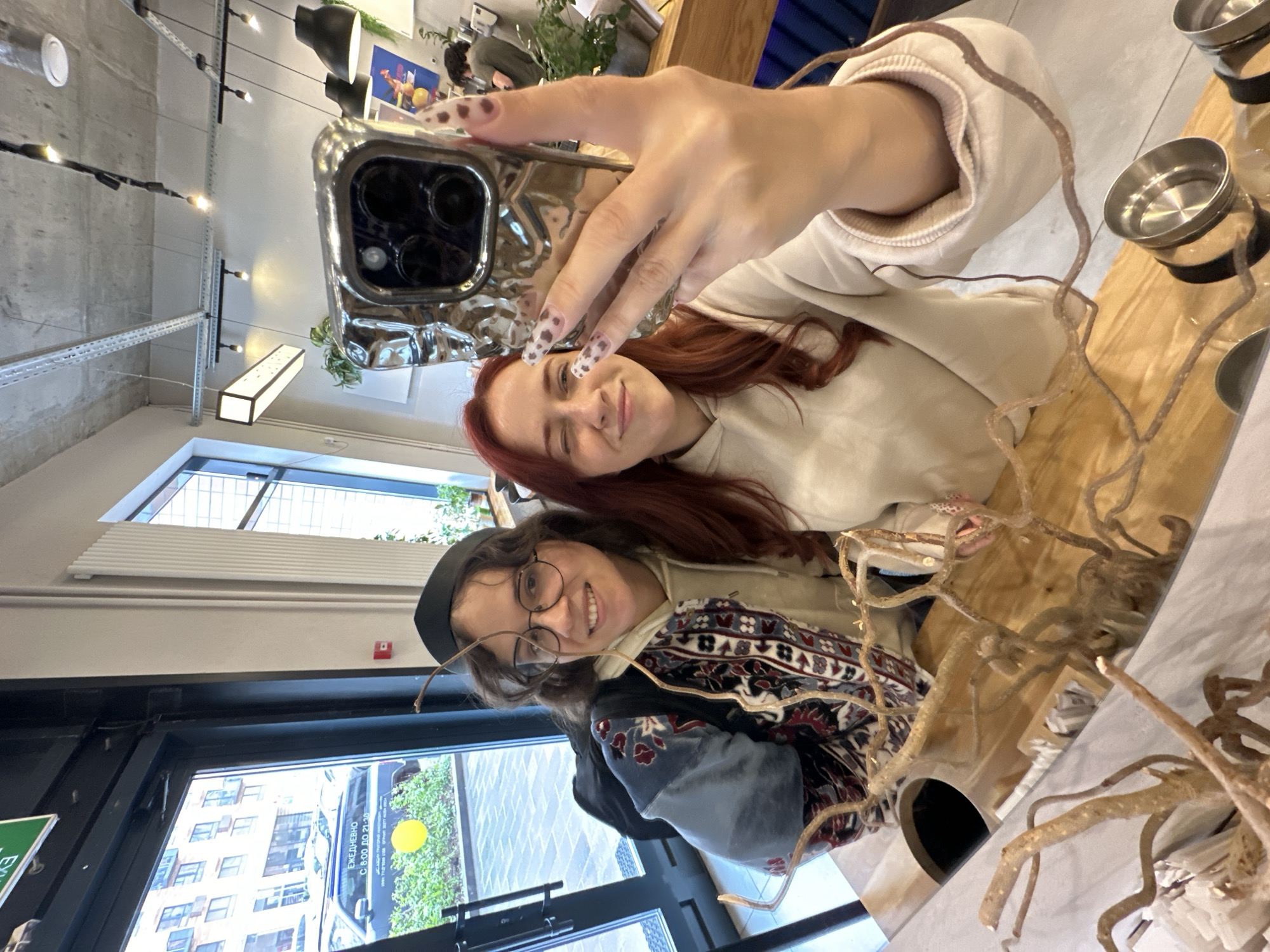 Casual moments captured: cafe selfie, pigeons feeding, strawberry display