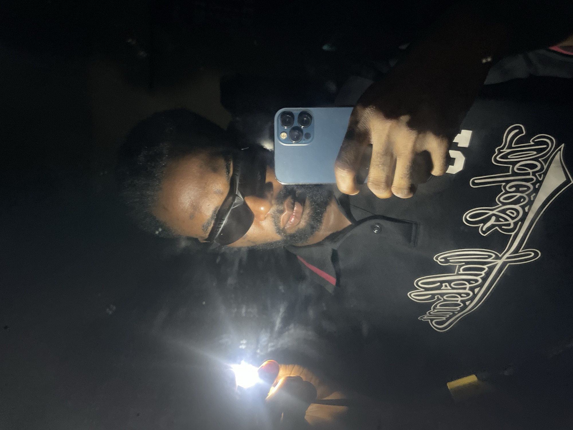 Man Takes Multiple Mirror Selfies in Lokoja Nigeria Evening