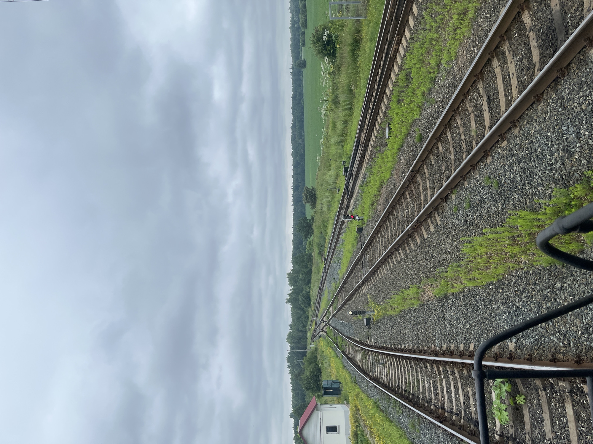 Aboard a train passing through Кемуль's railway yard