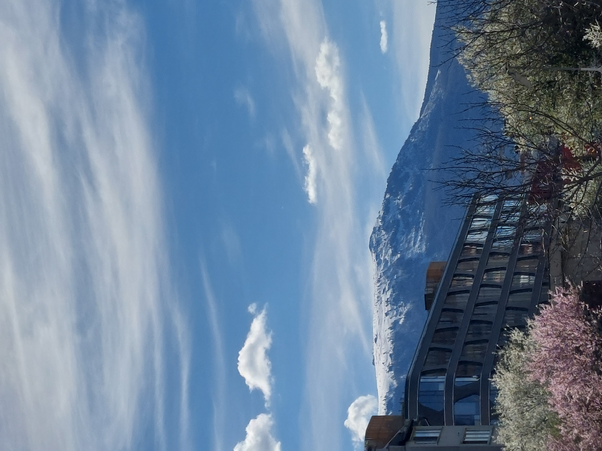 Modern building photographed against mountain backdrop in Sofia