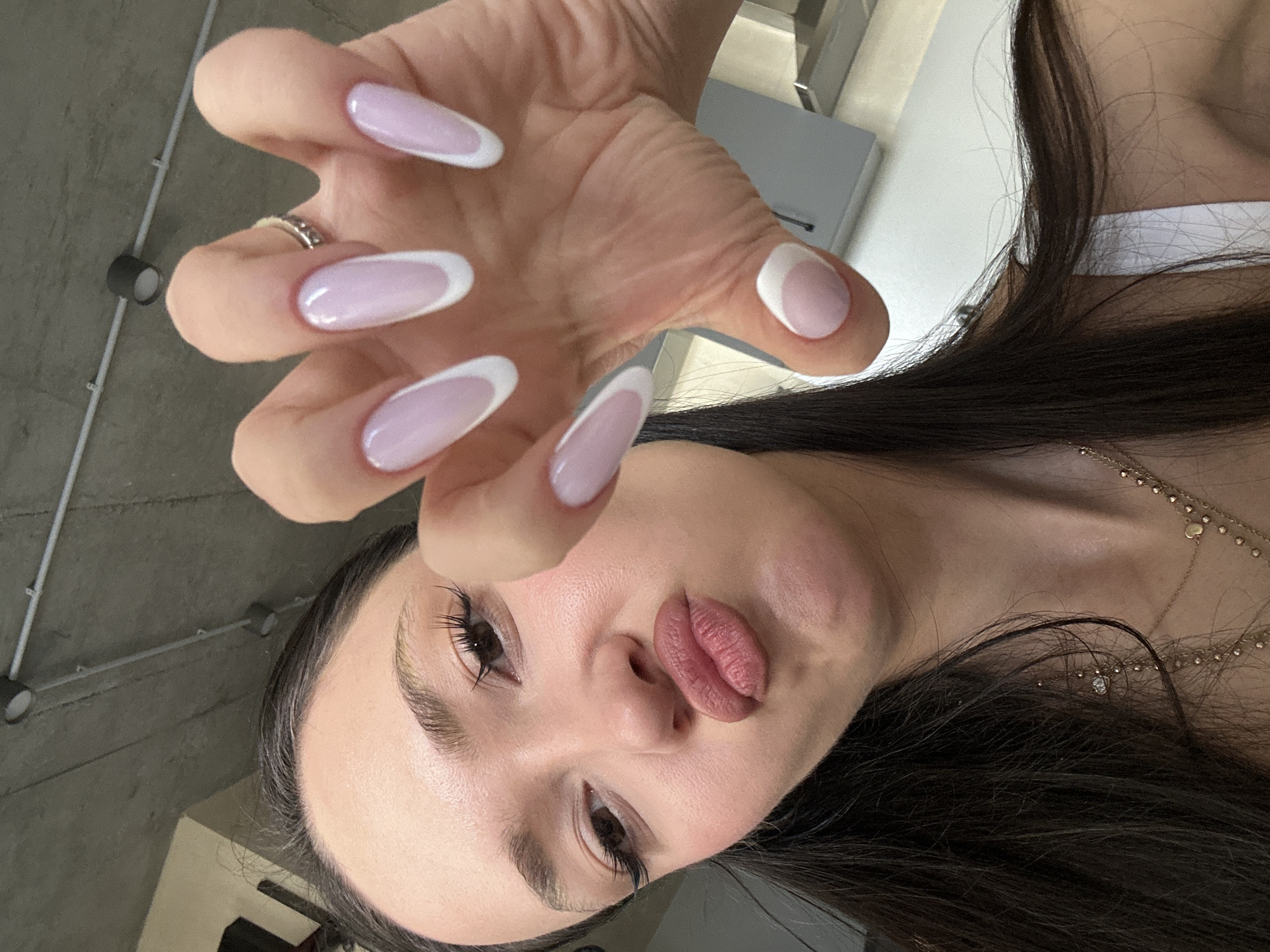 Woman shows off French manicure, takes kitchen selfie in Armenia