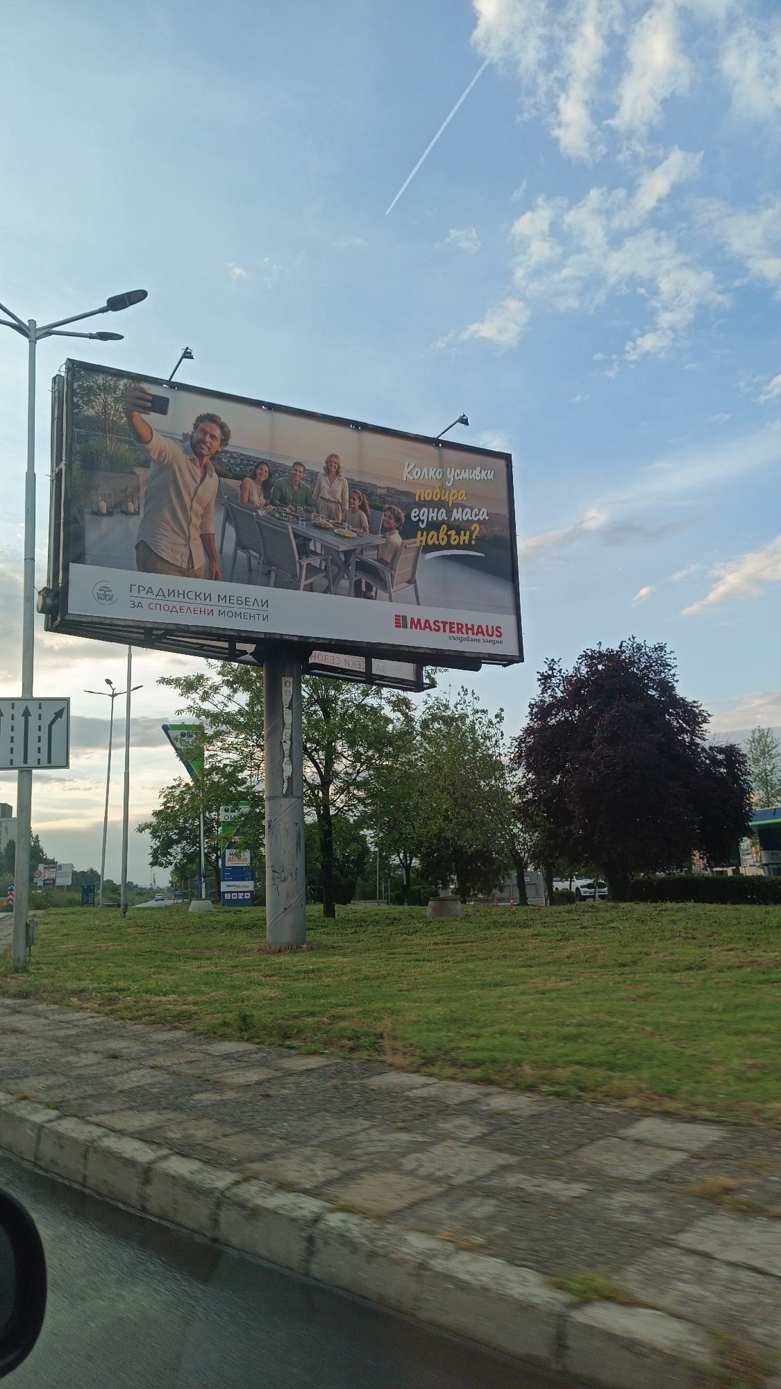Vehicle journey documents commercial district scenes in Burgas, Bulgaria