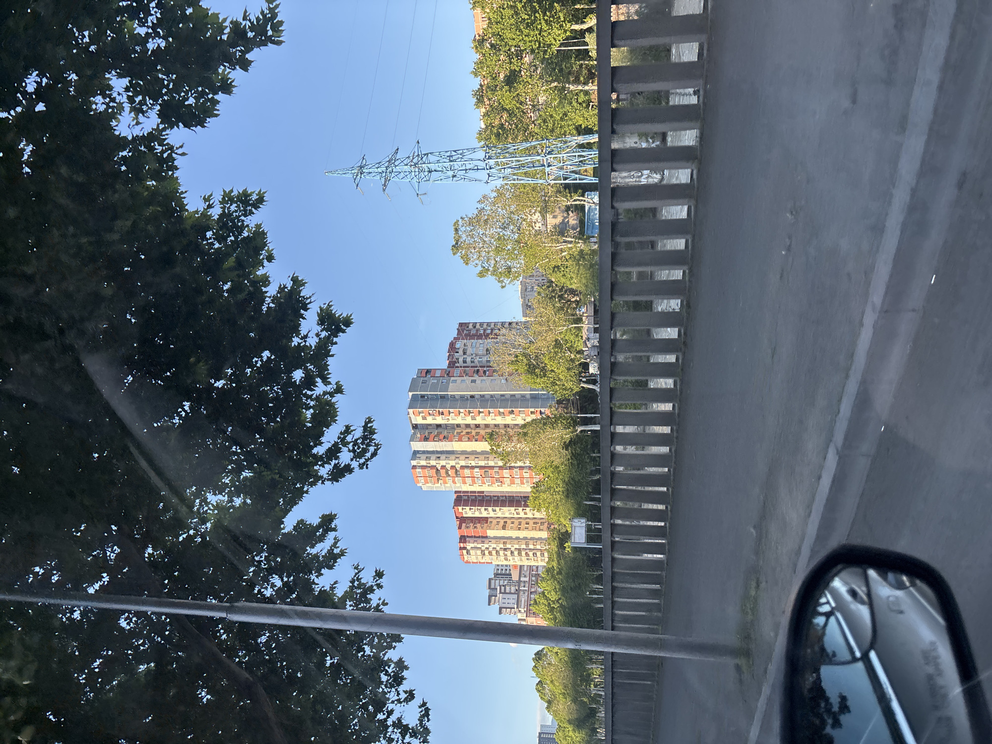 Driver captures everyday Tbilisi cityscape during afternoon commute