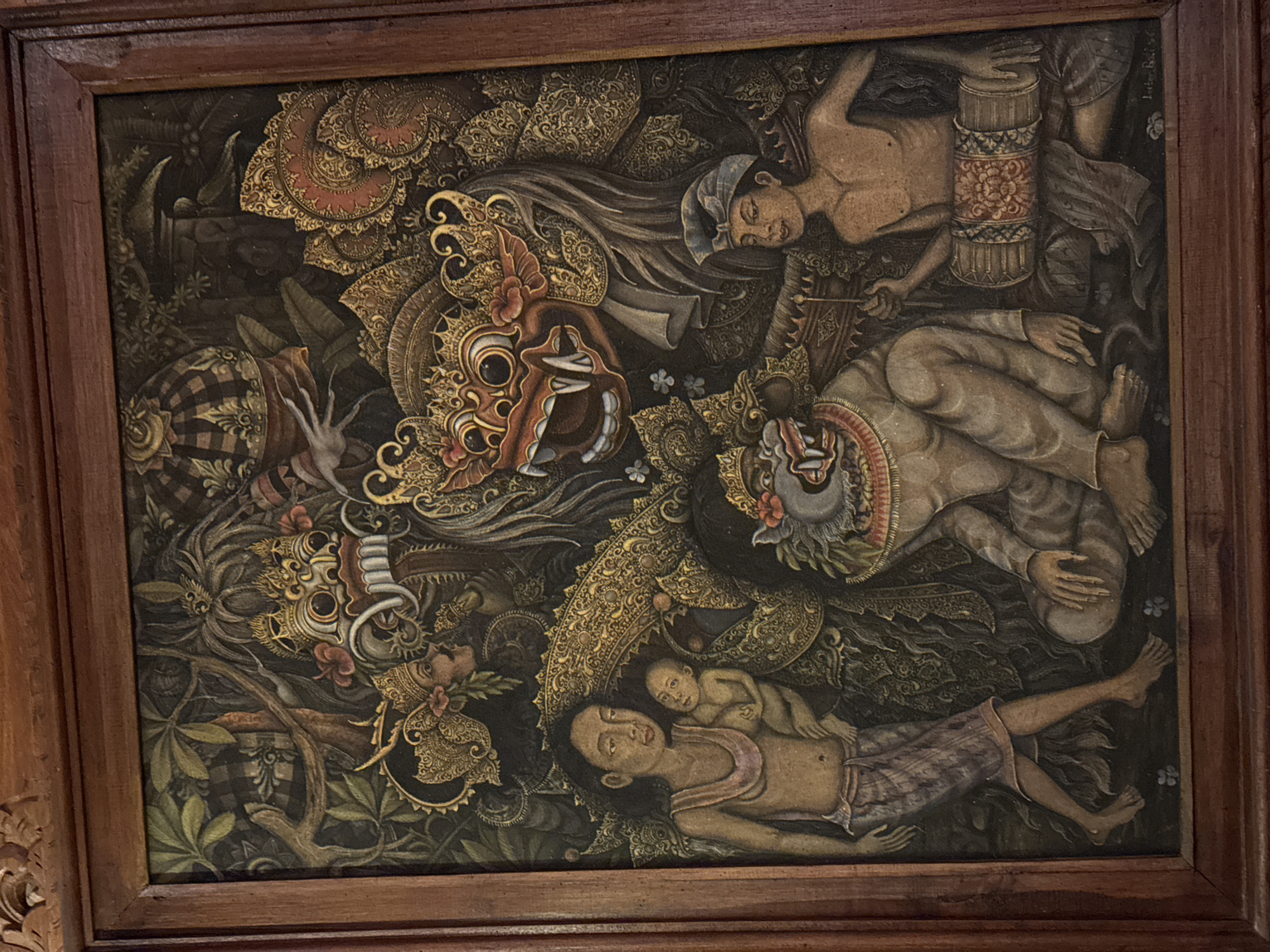 Restaurant interior featuring traditional Balinese art documented in Kuta