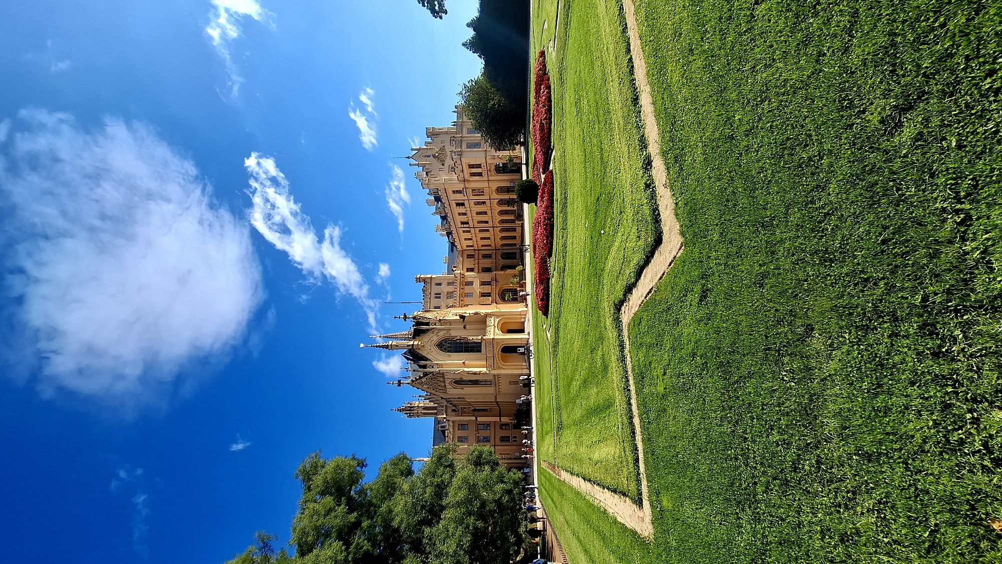 Lednice Castle's Gothic facade under a clear summer sky