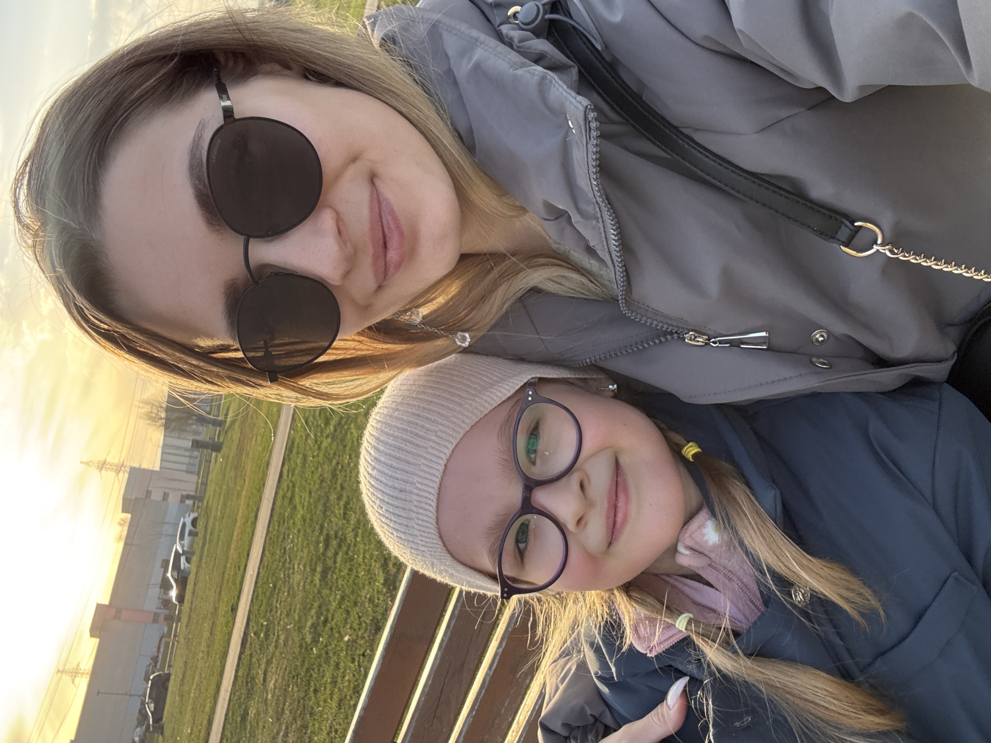 Woman and child enjoy afternoon outing in Moscow park