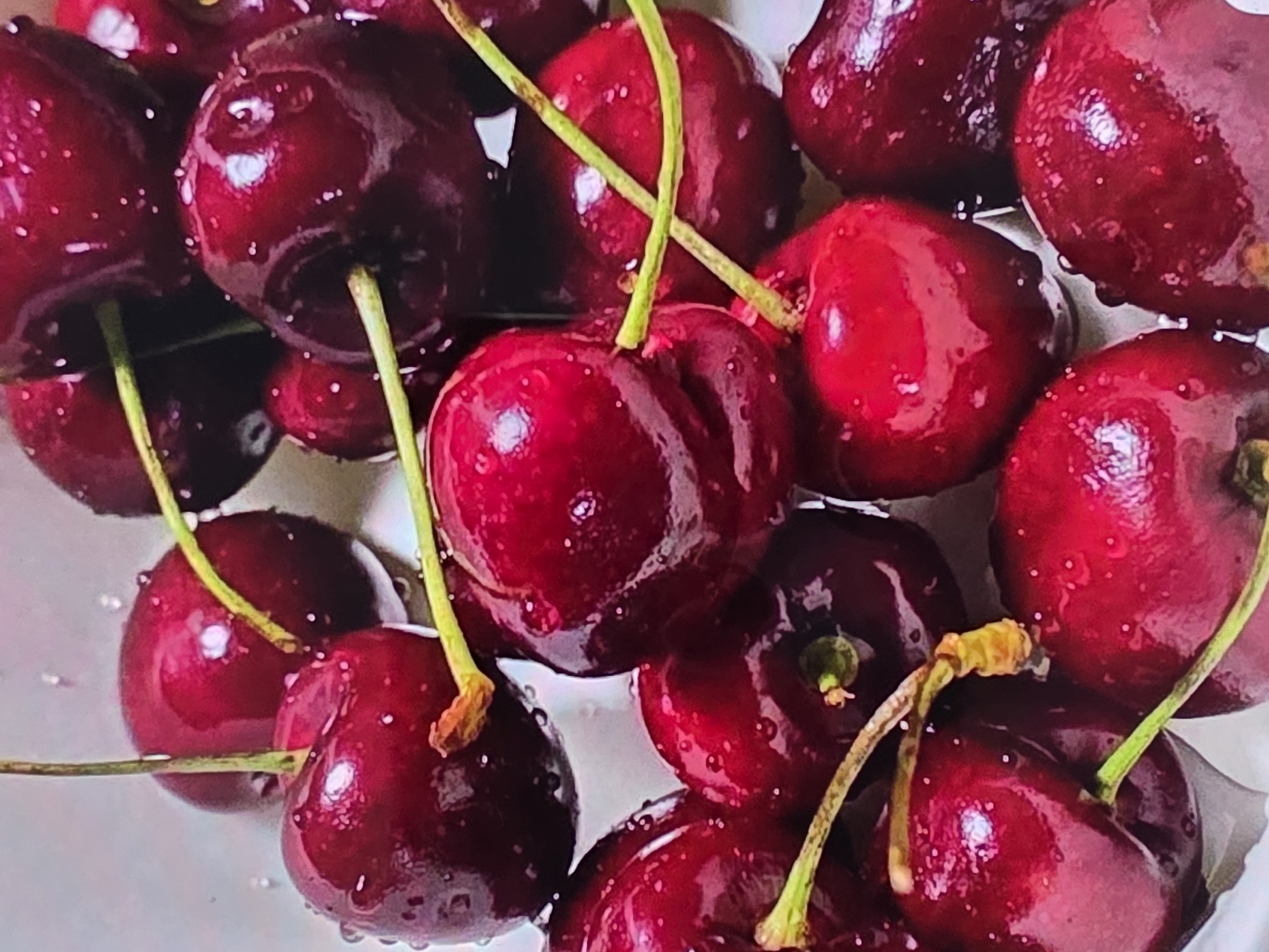 Fresh fruit preparation with cherries and sugared strawberries