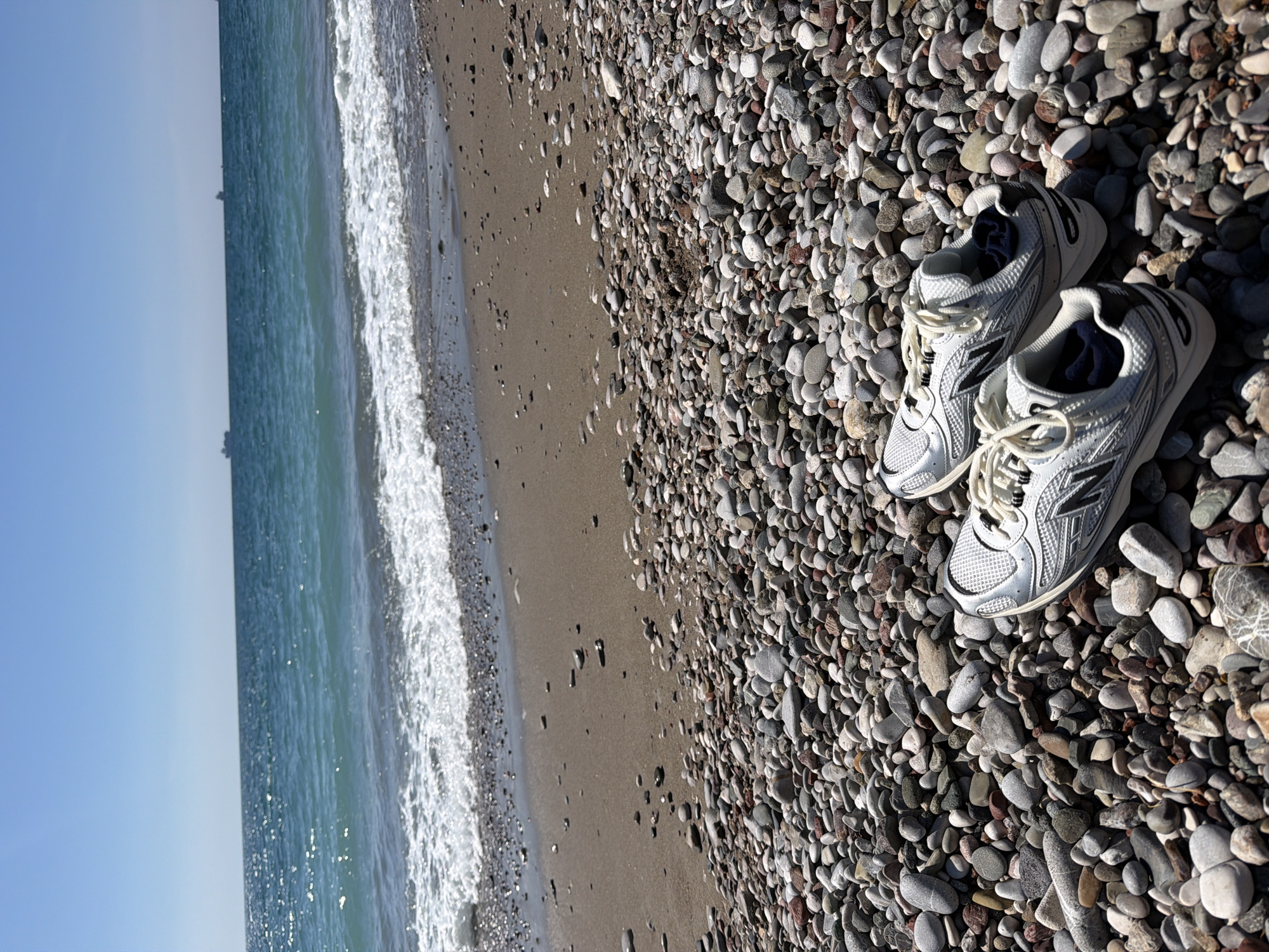 Sneakers left on Montenegro beach amid calm seas
