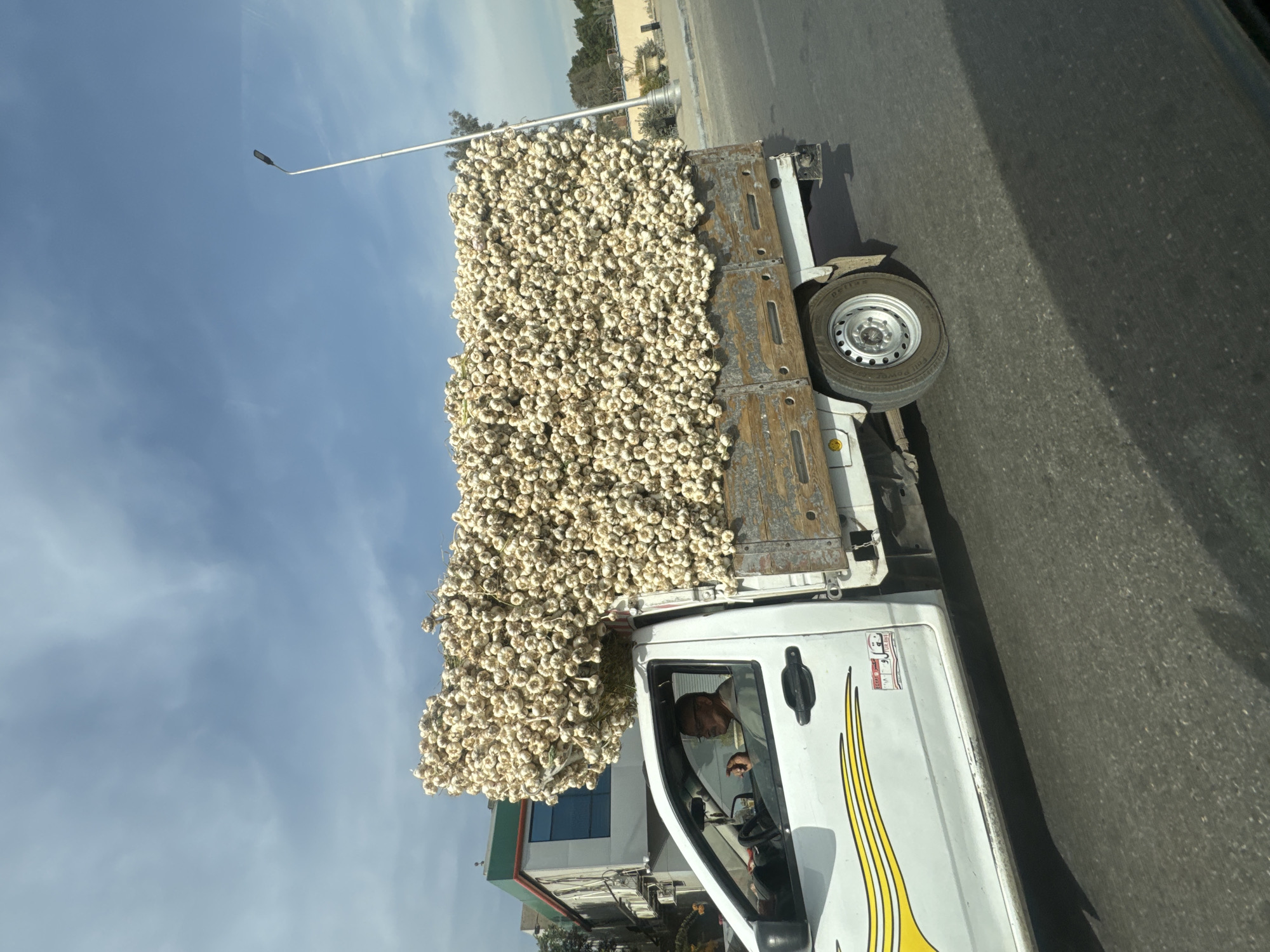 Daily life documented in Kafrat Nassar: produce truck, museum interior