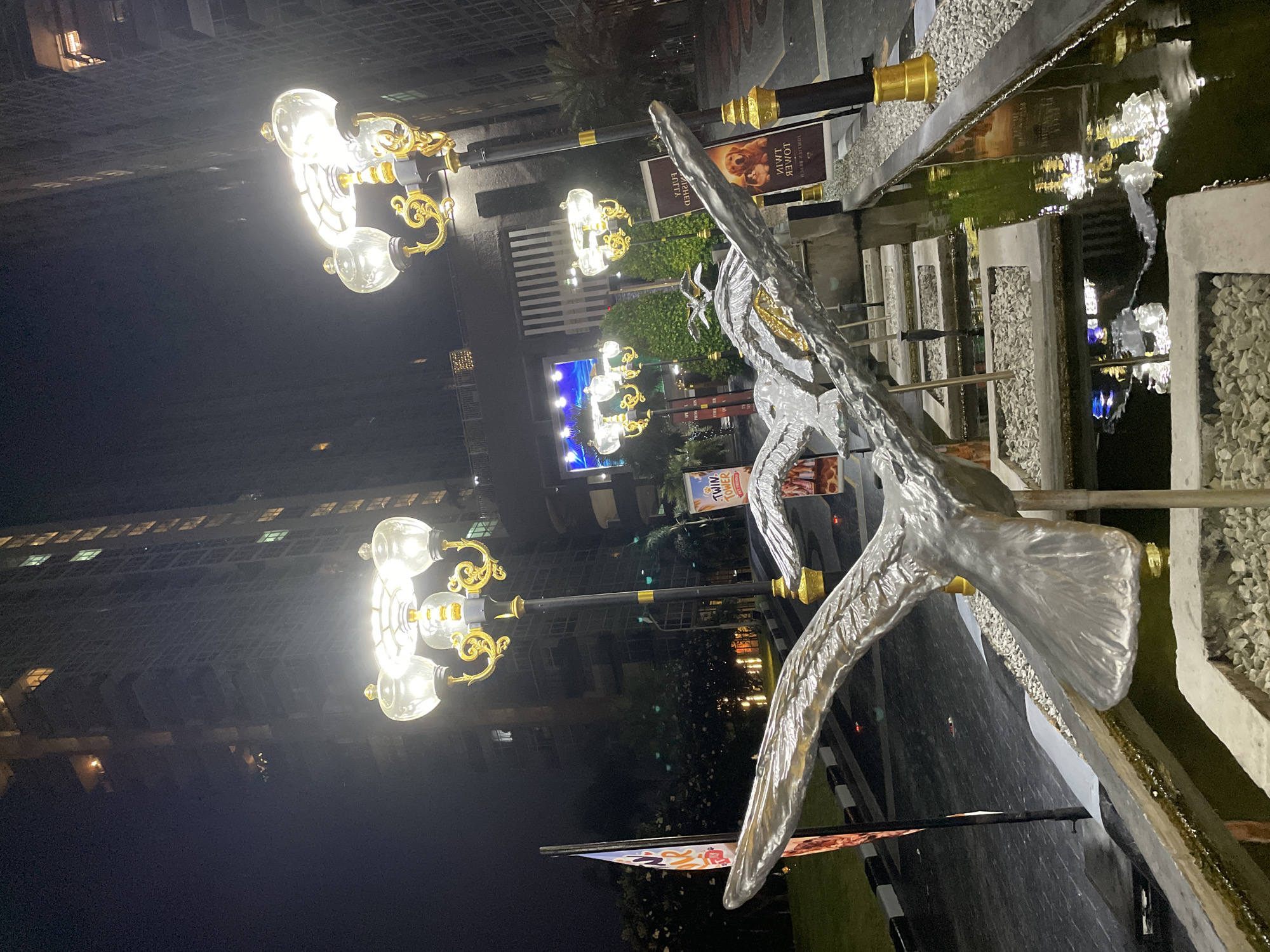 Illuminated sculptures and water features at Pattaya's Grand Jomtien complex
