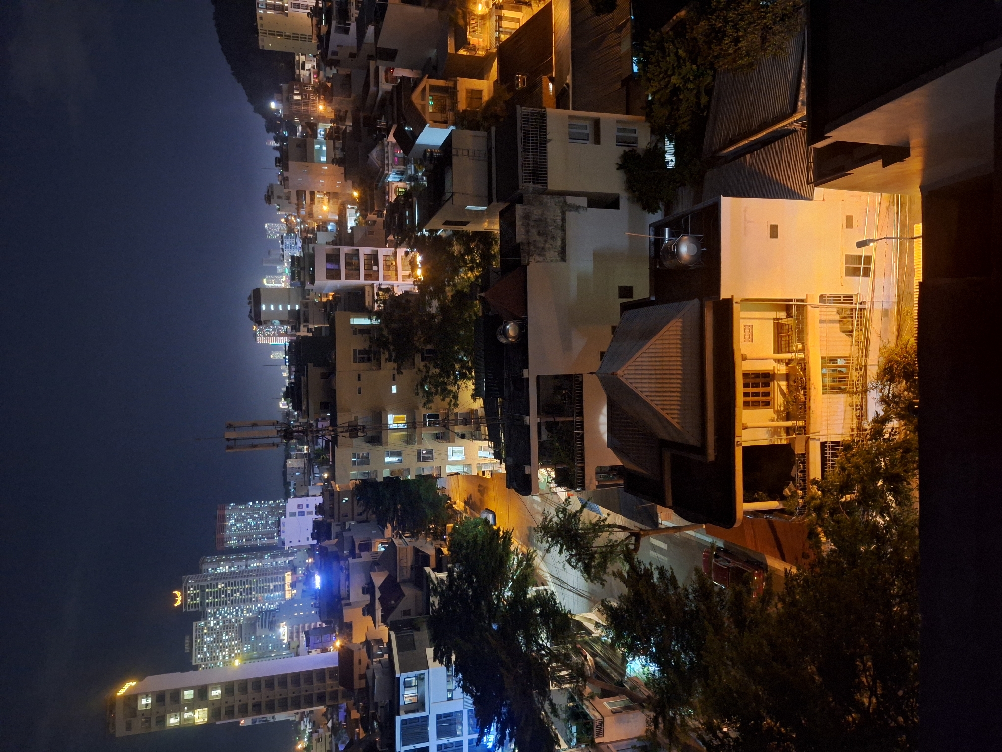 Nha Trang city lights and skyline under a full moon