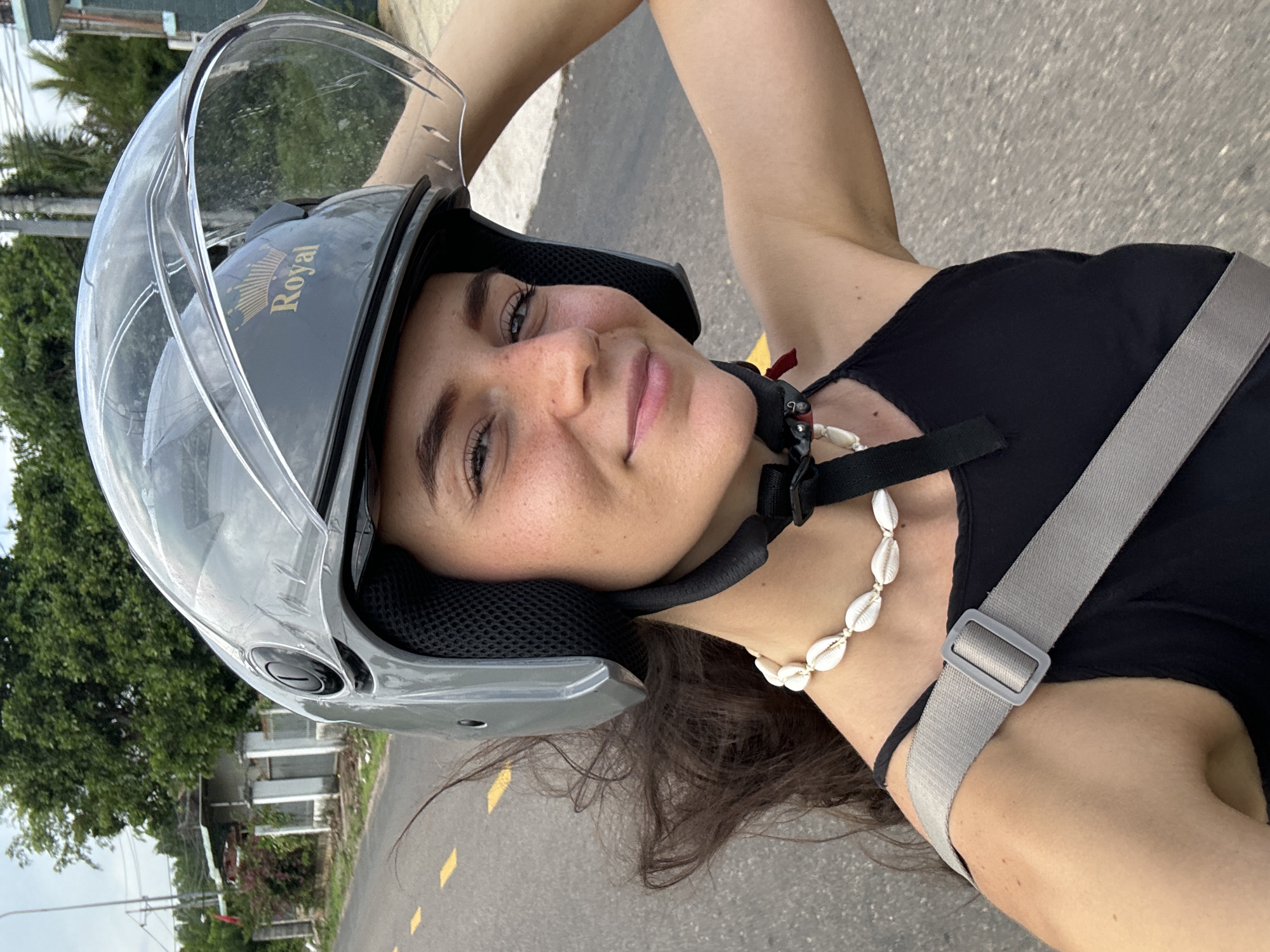 Motorcycle journey documented through selfies in Mũi Né, Vietnam
