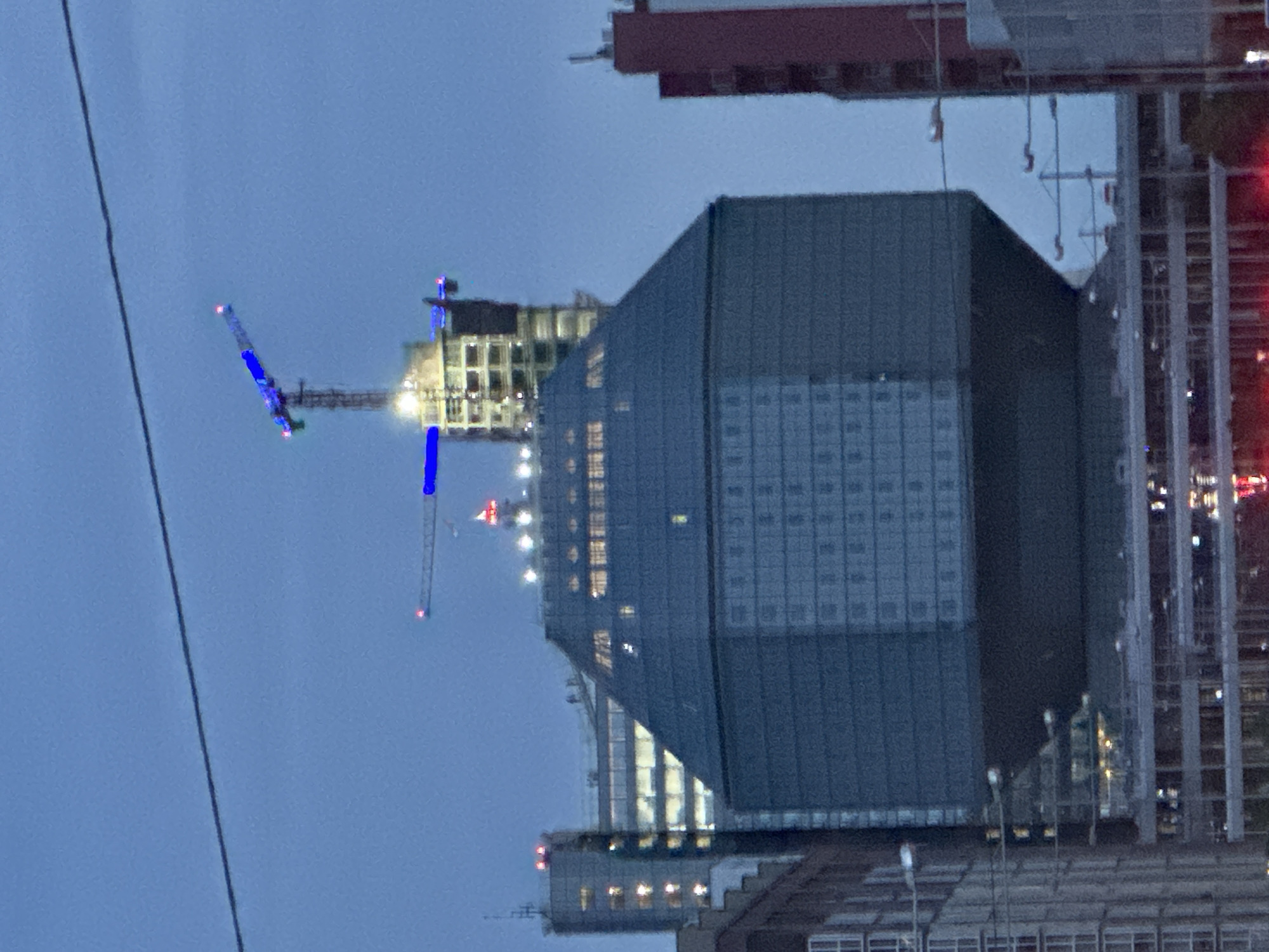 Evening scenes documented across Minsk including library, buildings, helicopter