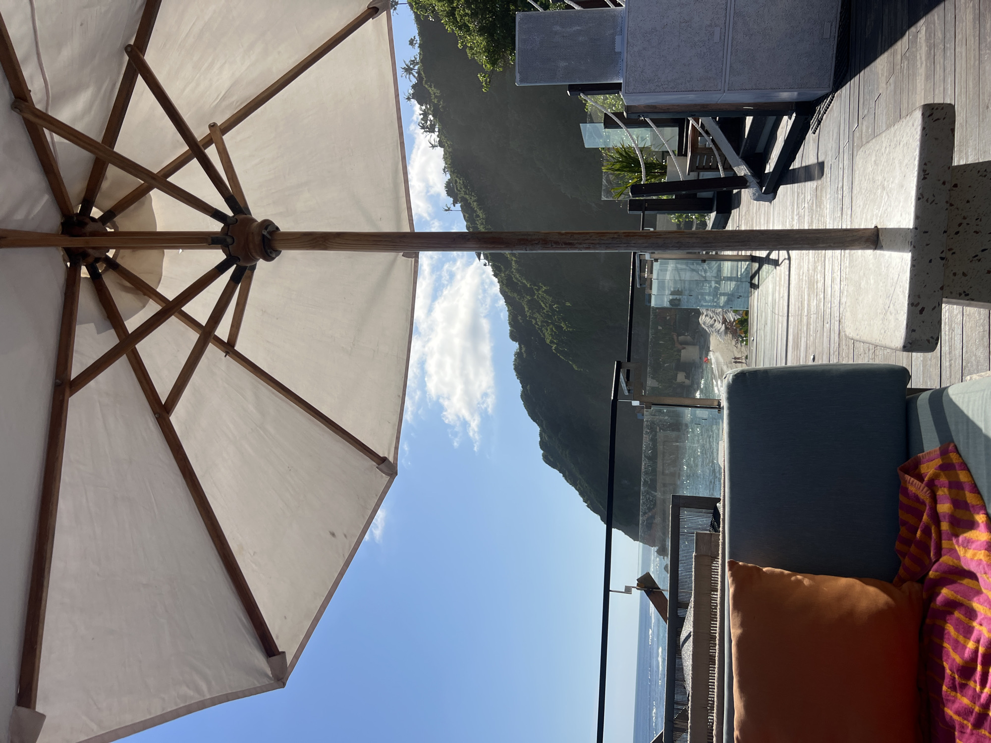 Seaside patio lounge area observed Sunday morning