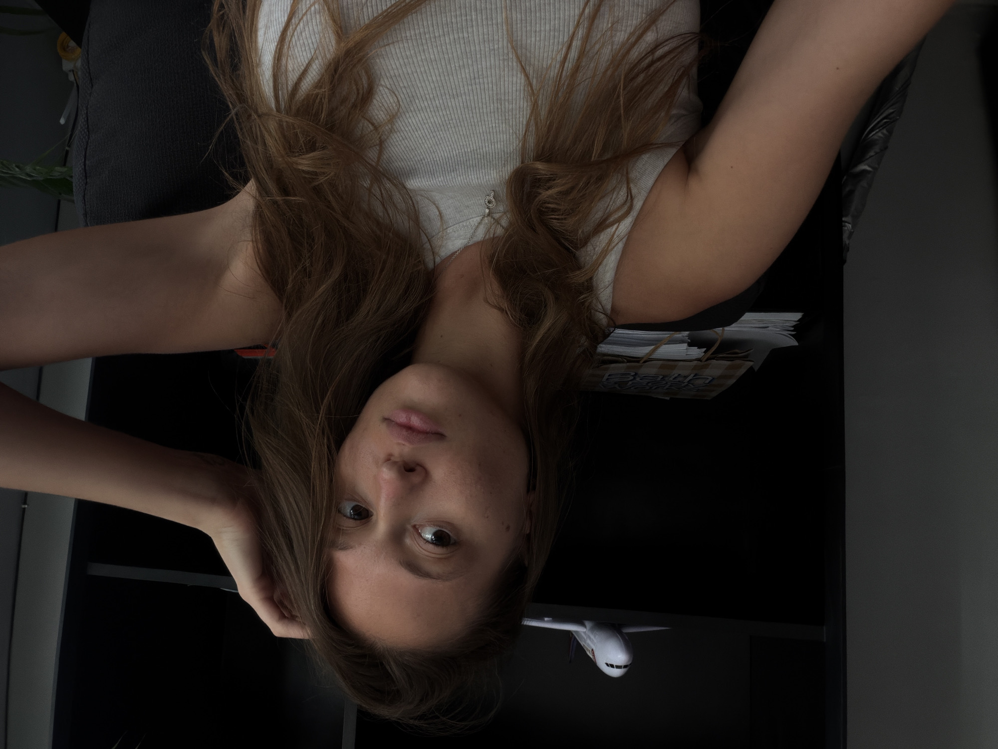 Woman photographed upside down in Kerobokan Kelod Indonesia