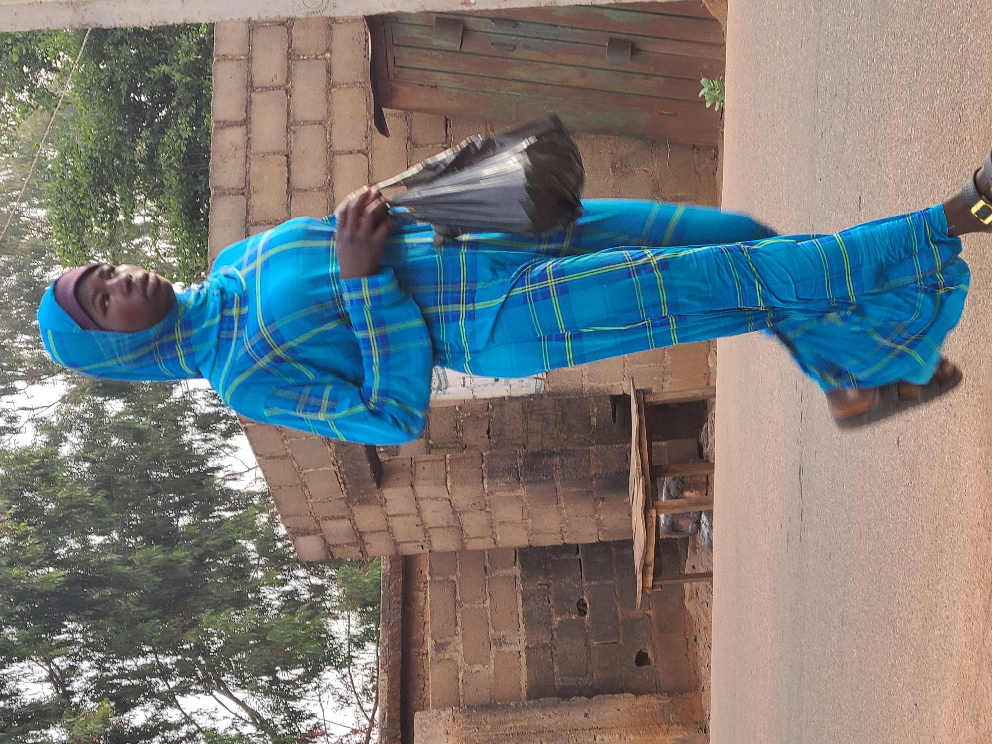 Ordinary street life documented across Jos, Nigeria neighborhoods