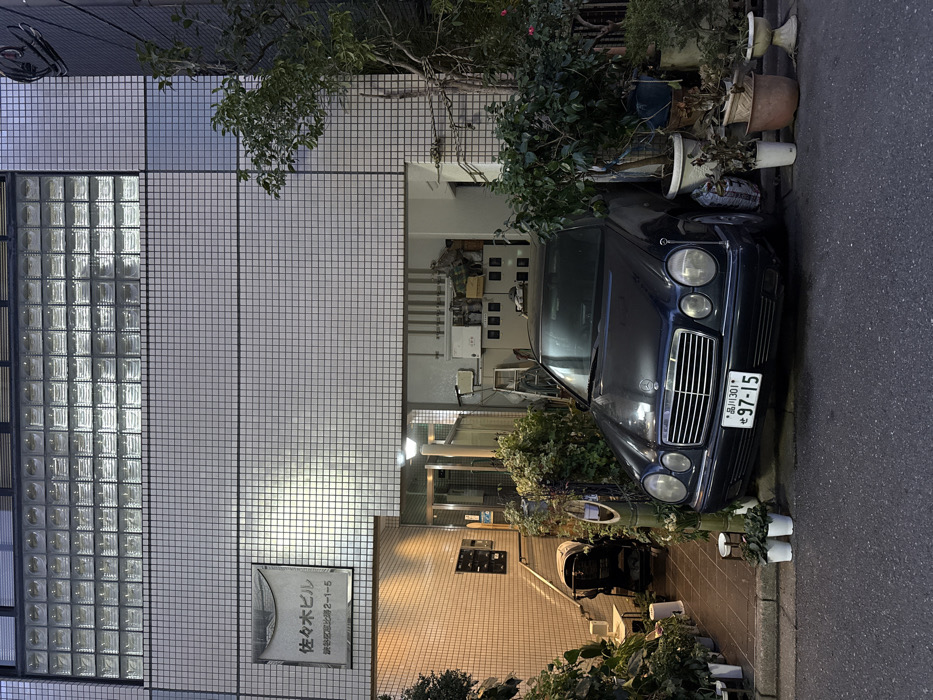 Building with plaque observed in Shibuya's Tomigaya district