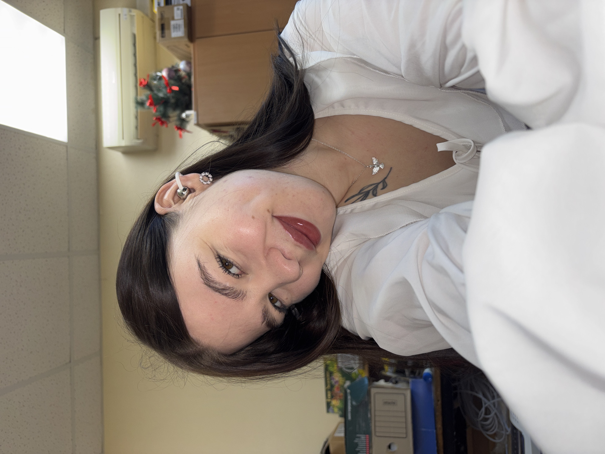 Woman photographed twice in office setting in Perm