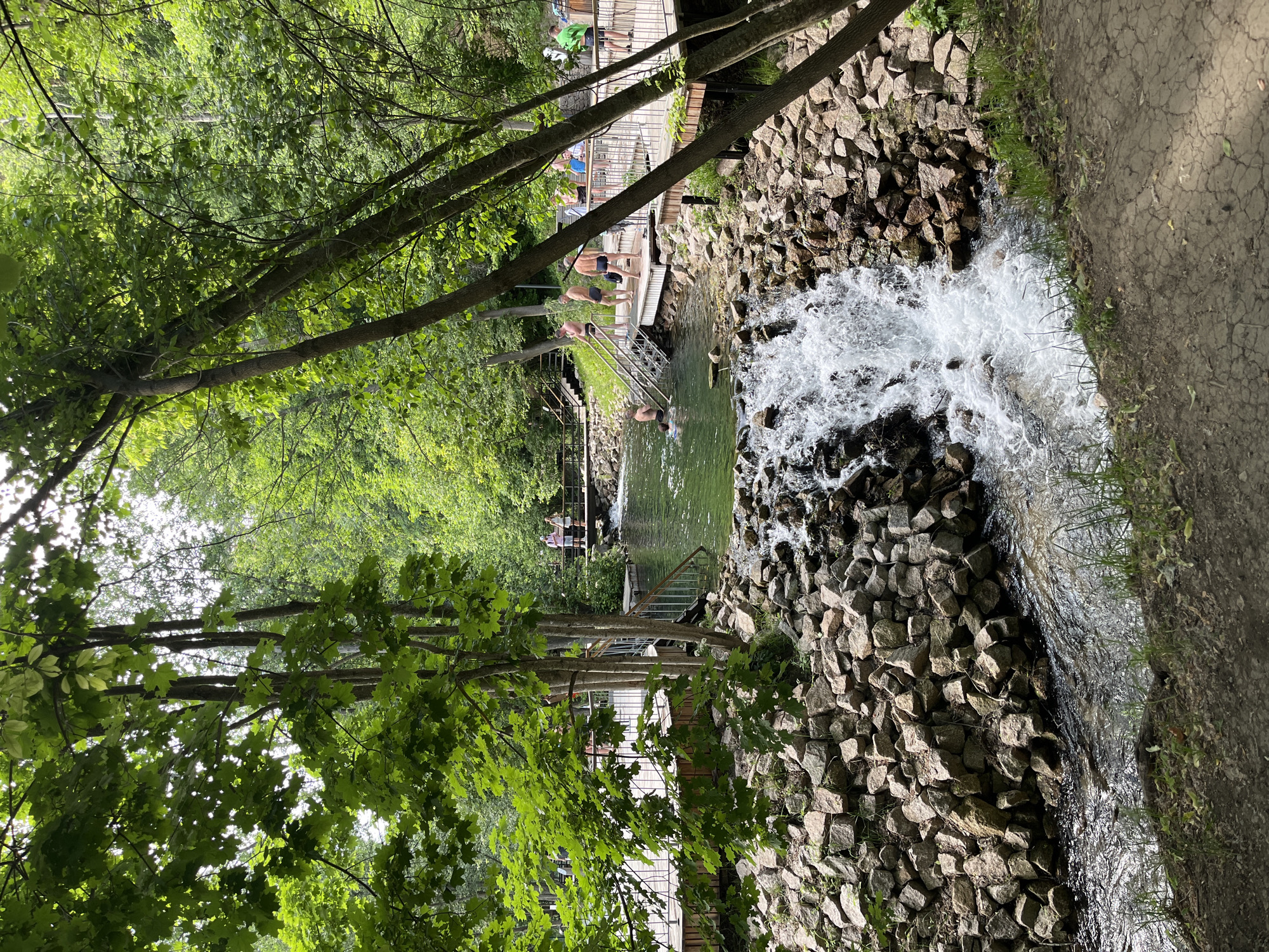 Small waterfall over rocky embankment in a Kazan park
