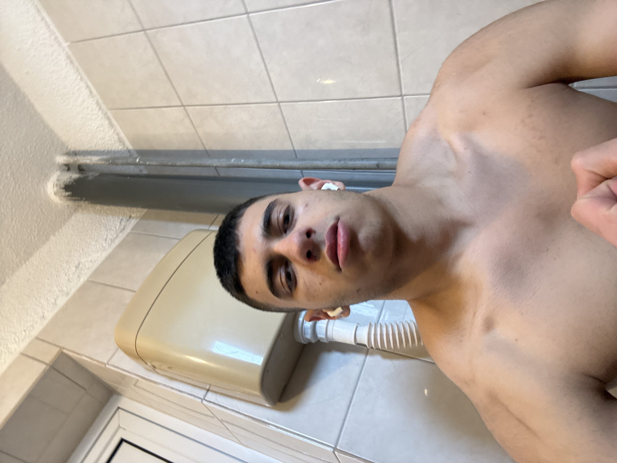 Young man photographed in bathroom and gaming setup in Sofia