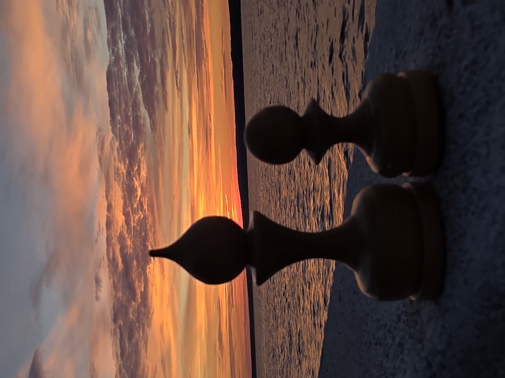 Sunset evening on the Kama River with chess and river barges