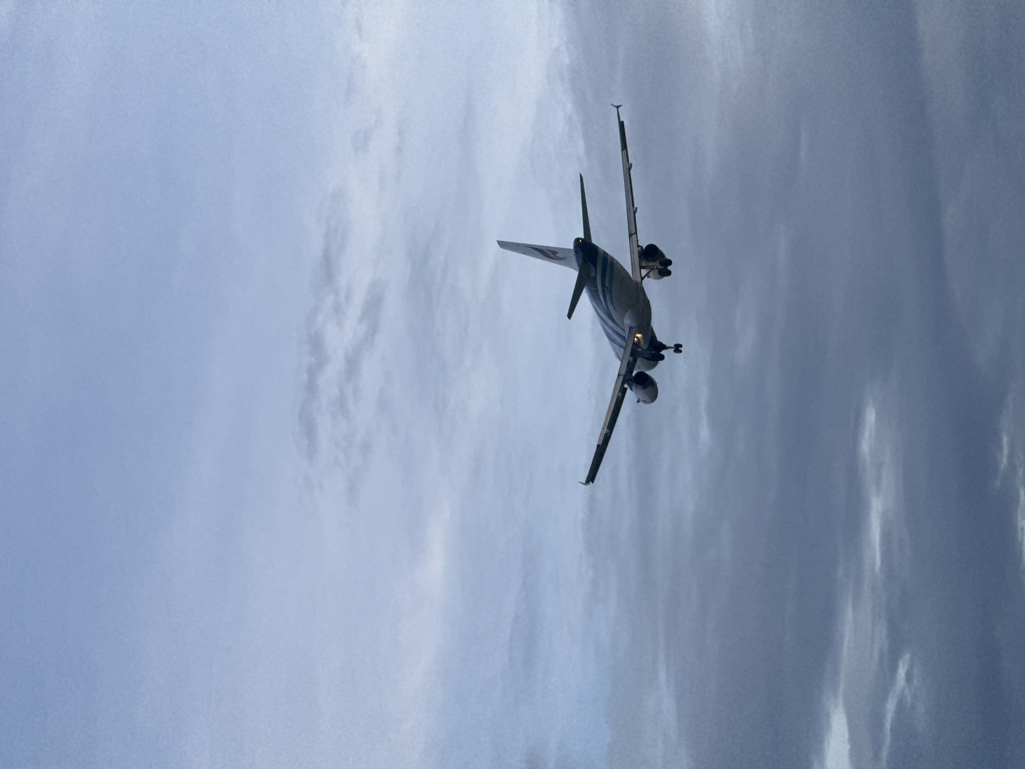 Ko Samui morning: beaches, a Buddhist temple, and a landing plane