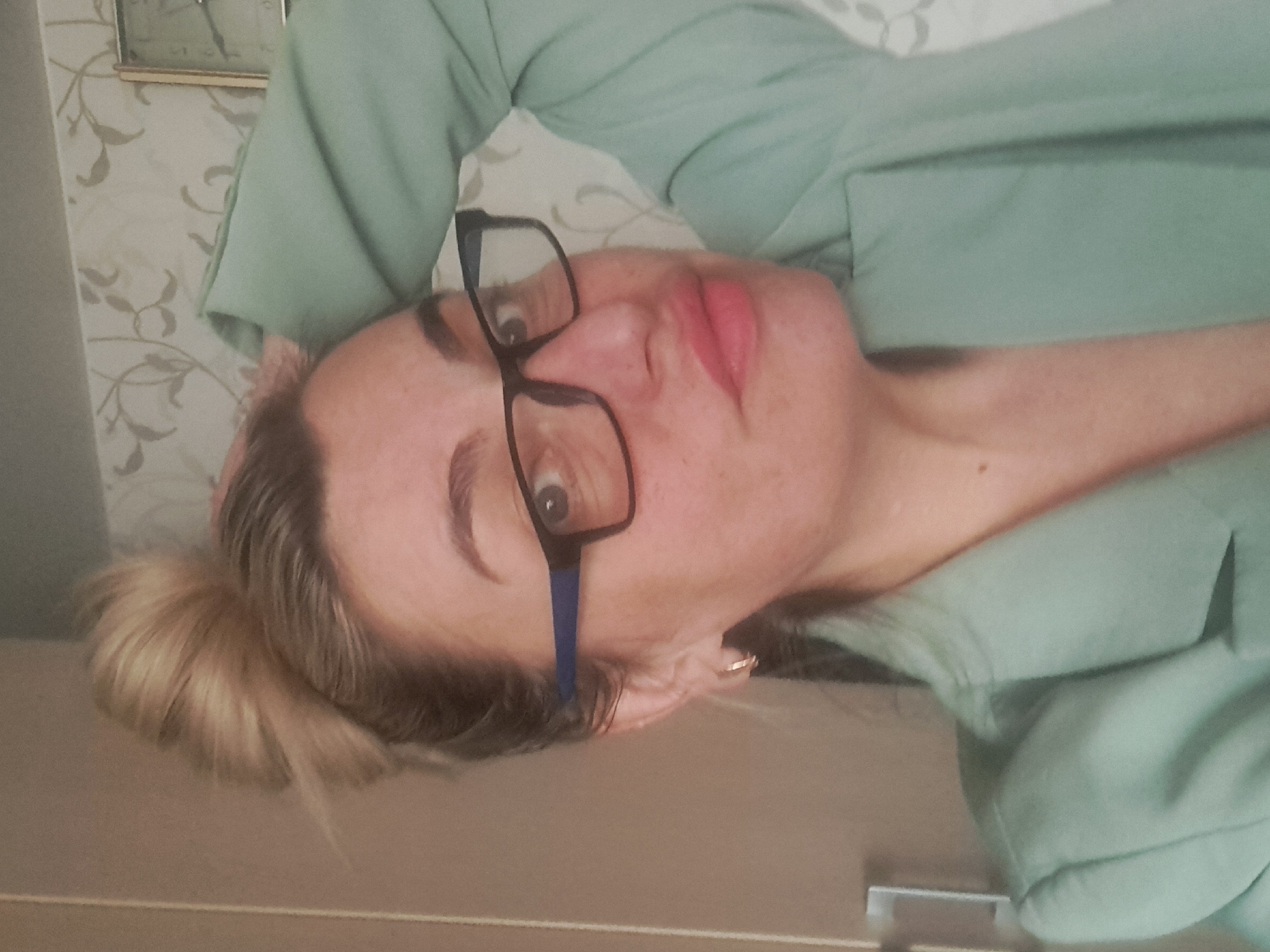 Woman documents morning routine with selfies and household items