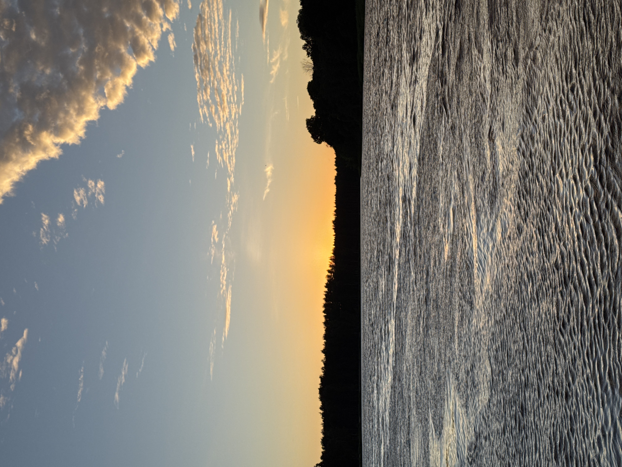 Gauja River sunset paints the Carnikava sky orange and blue