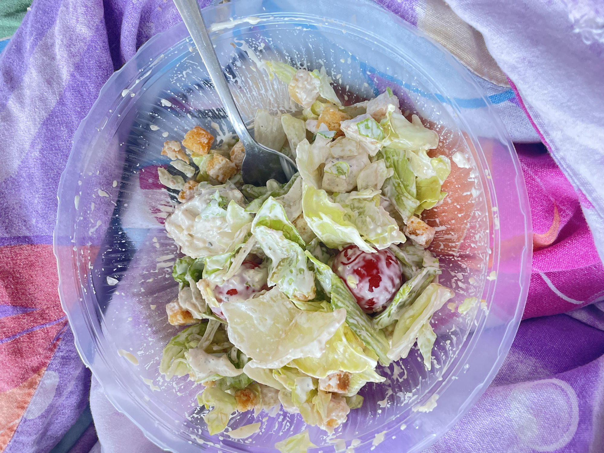 Morning meal observed in Saint Petersburg featuring salad and beverage