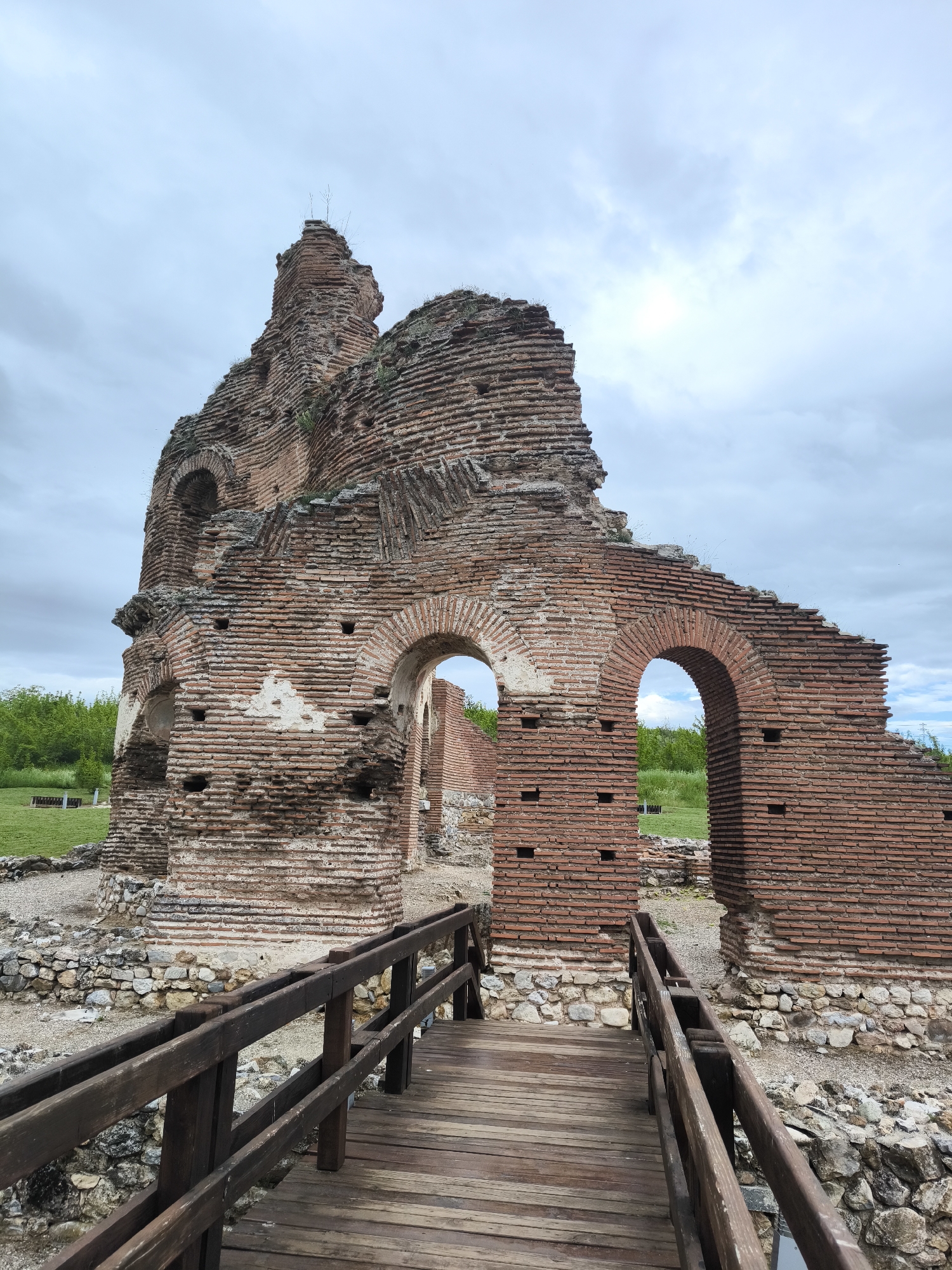 Visitors explore Red Church ruins in Perushtitsa, Bulgaria