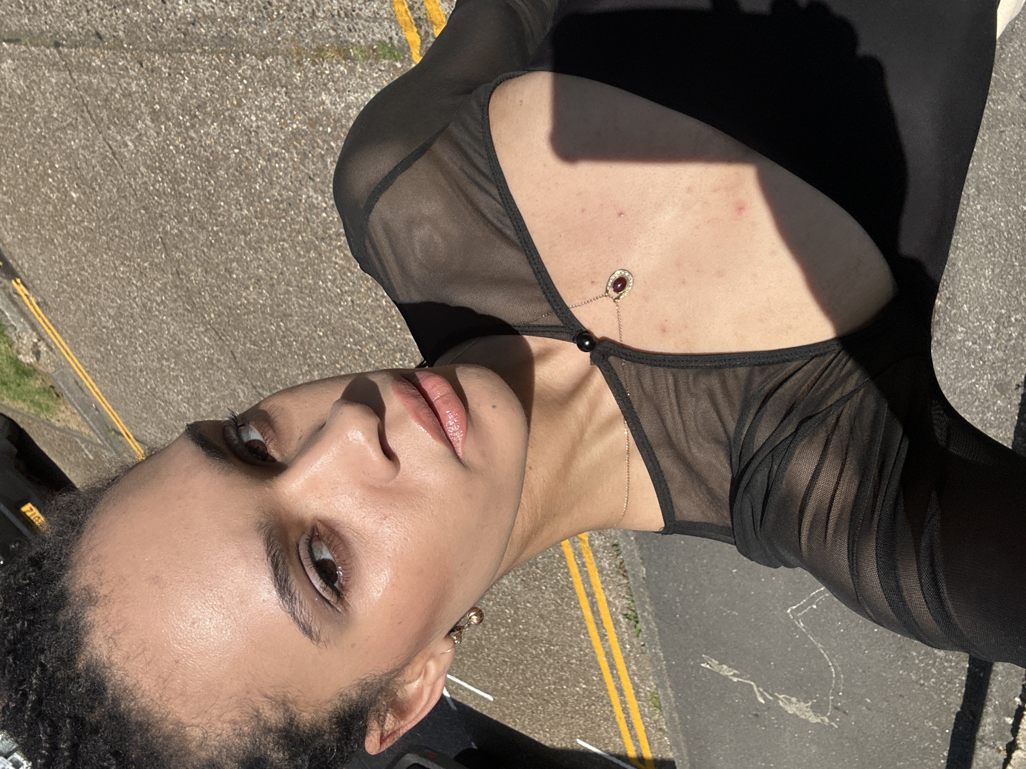 Person in black top observed on London street