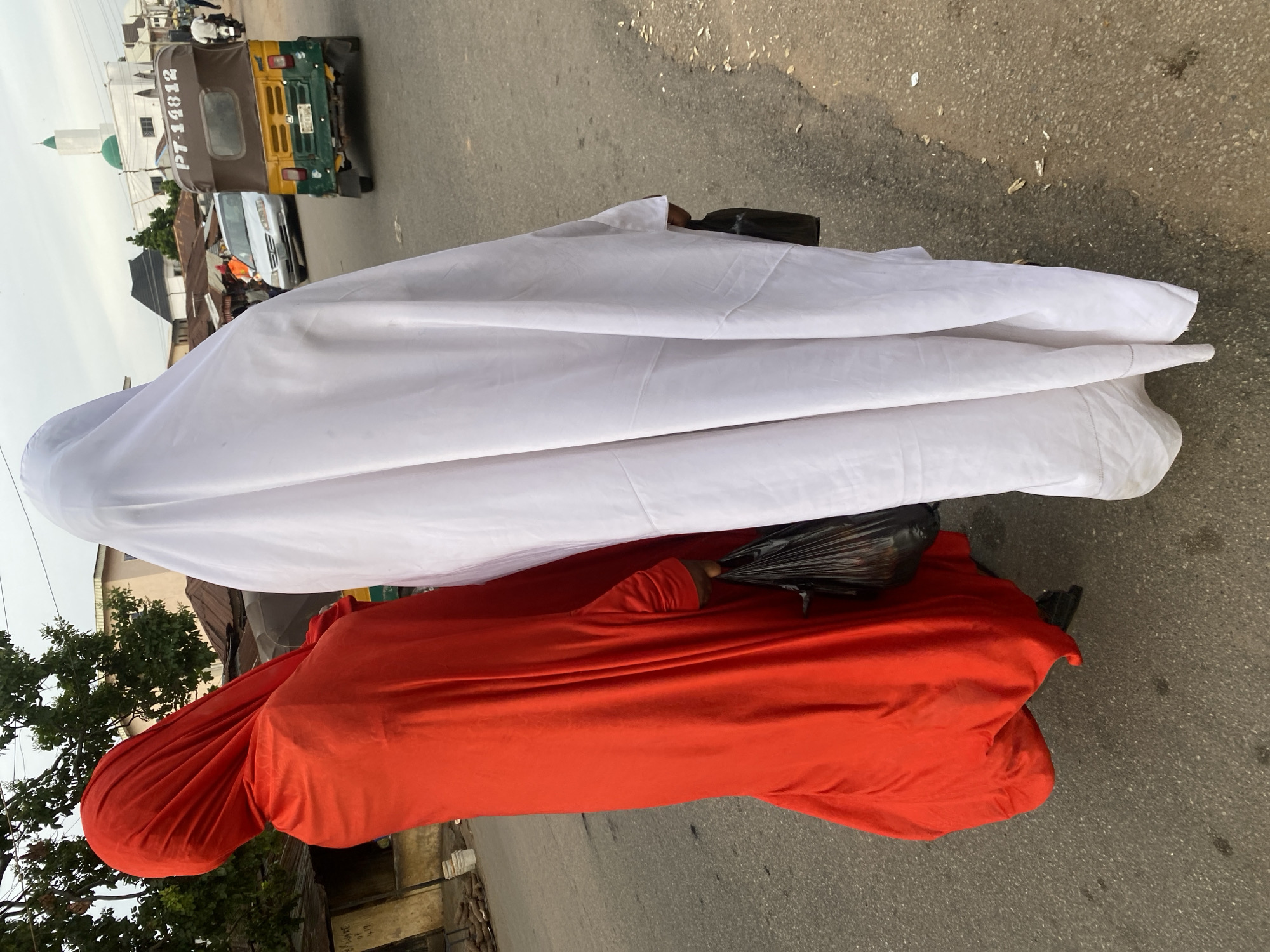 Street life and corn vendors on a Jos afternoon