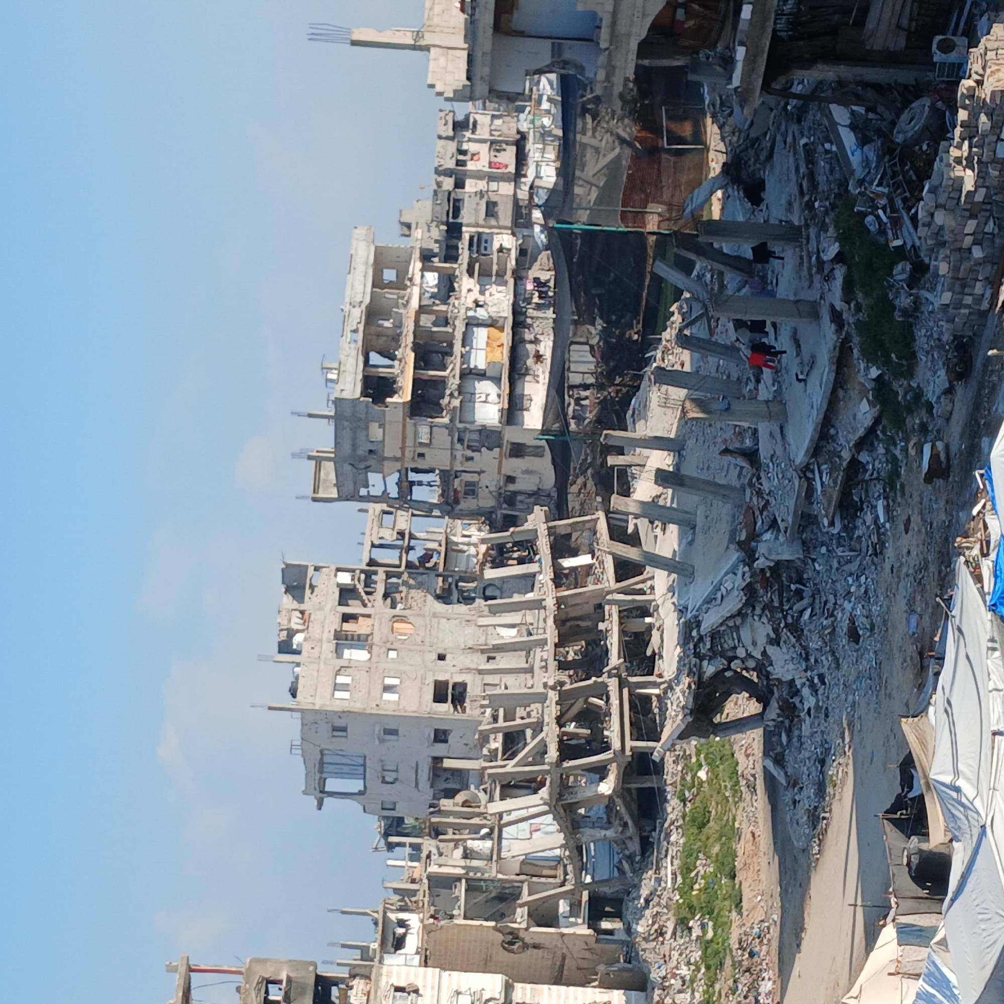 Gaza City shows widespread destruction, temporary tent settlements documented