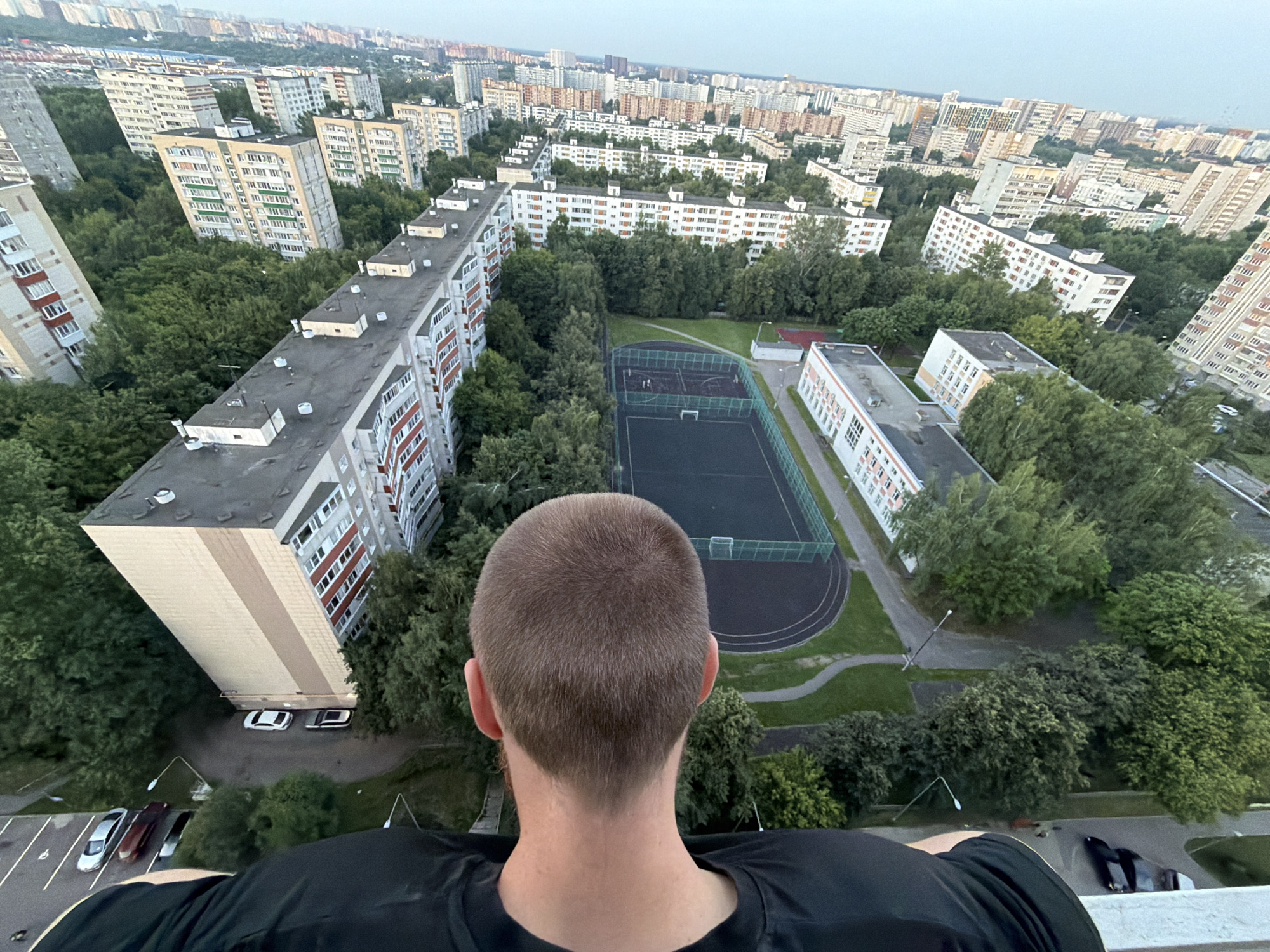 Aerial cityscape and close-up portraits in a brief urban moment