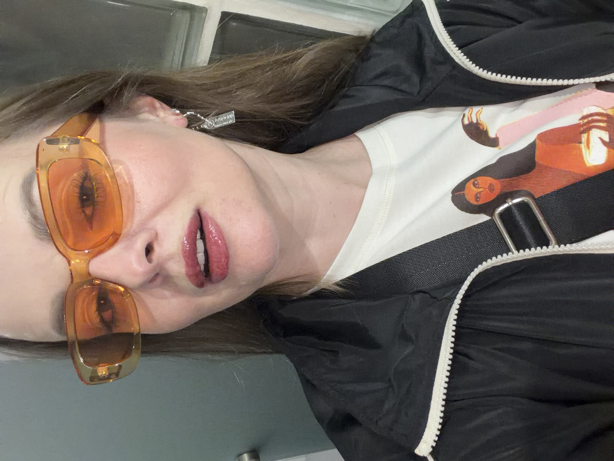 Woman takes selfie in distinctive outfit in Moscow