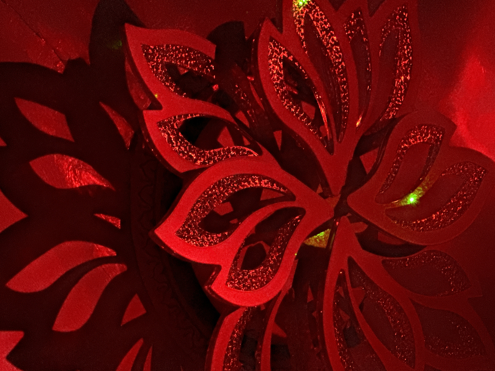 Red glittery decorative ornament photographed in Russian town